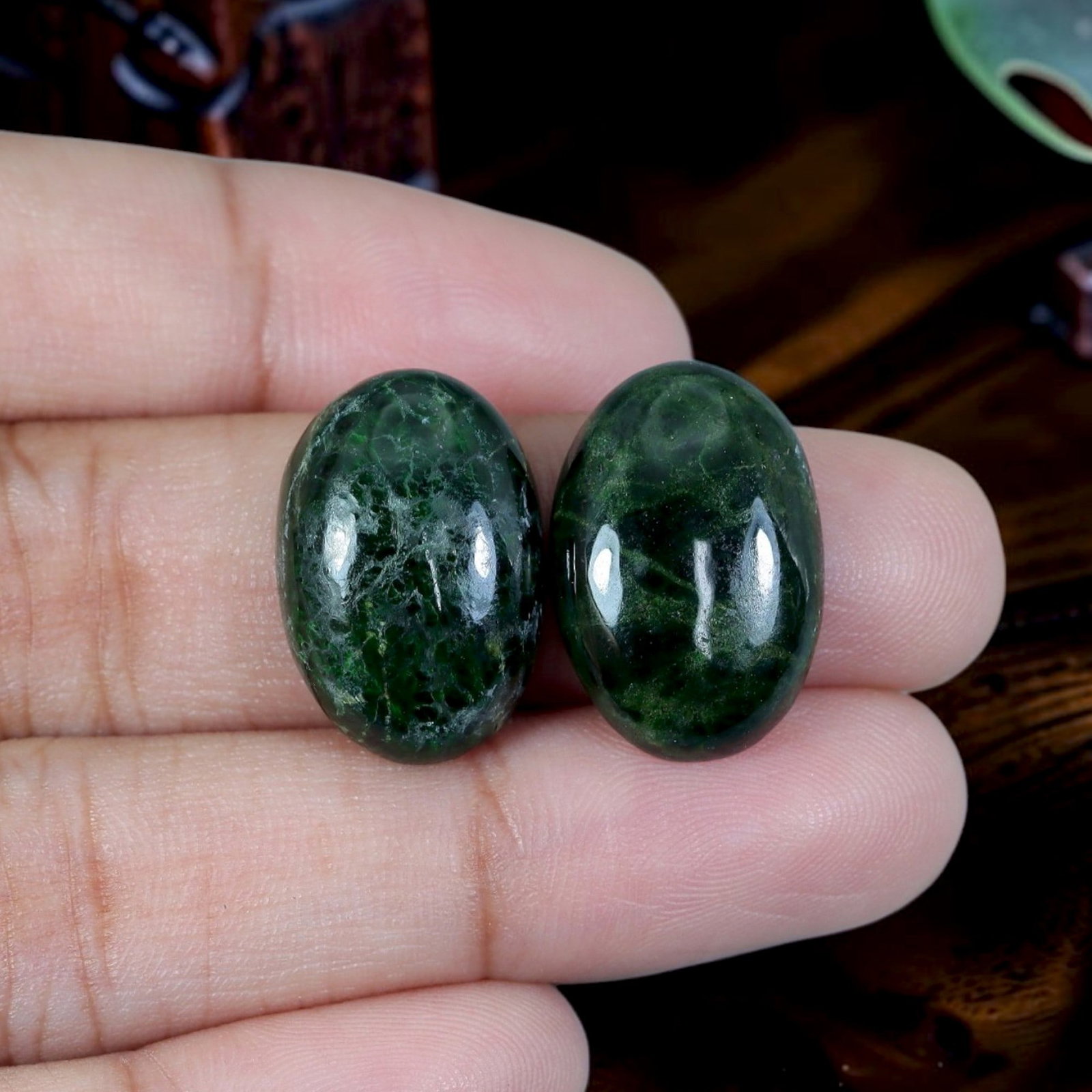 19.39ct Natural Burmese Type A Jadeite Jade Cabochon Pair, 17EC: Polished from untreated natural Burmese Type A jadeite jade, this matched oval cabochon pair features smooth domed polish and thin flat bases crafted for custom earring mounting. Deep dark moss green 