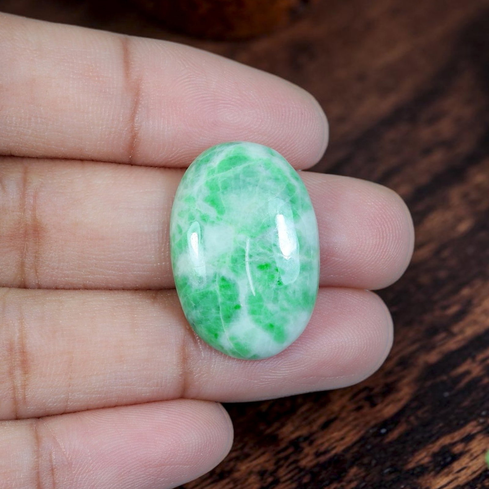 15.83ct Natural Burmese Type A Jadeite Jade Cabochon, 81EB: Crafted from untreated natural Burmese Type A jadeite jade, this oval cabochon features polished domed surface paired with flat base tailored for ring and pendant mounting. Opaque milky white matrix i