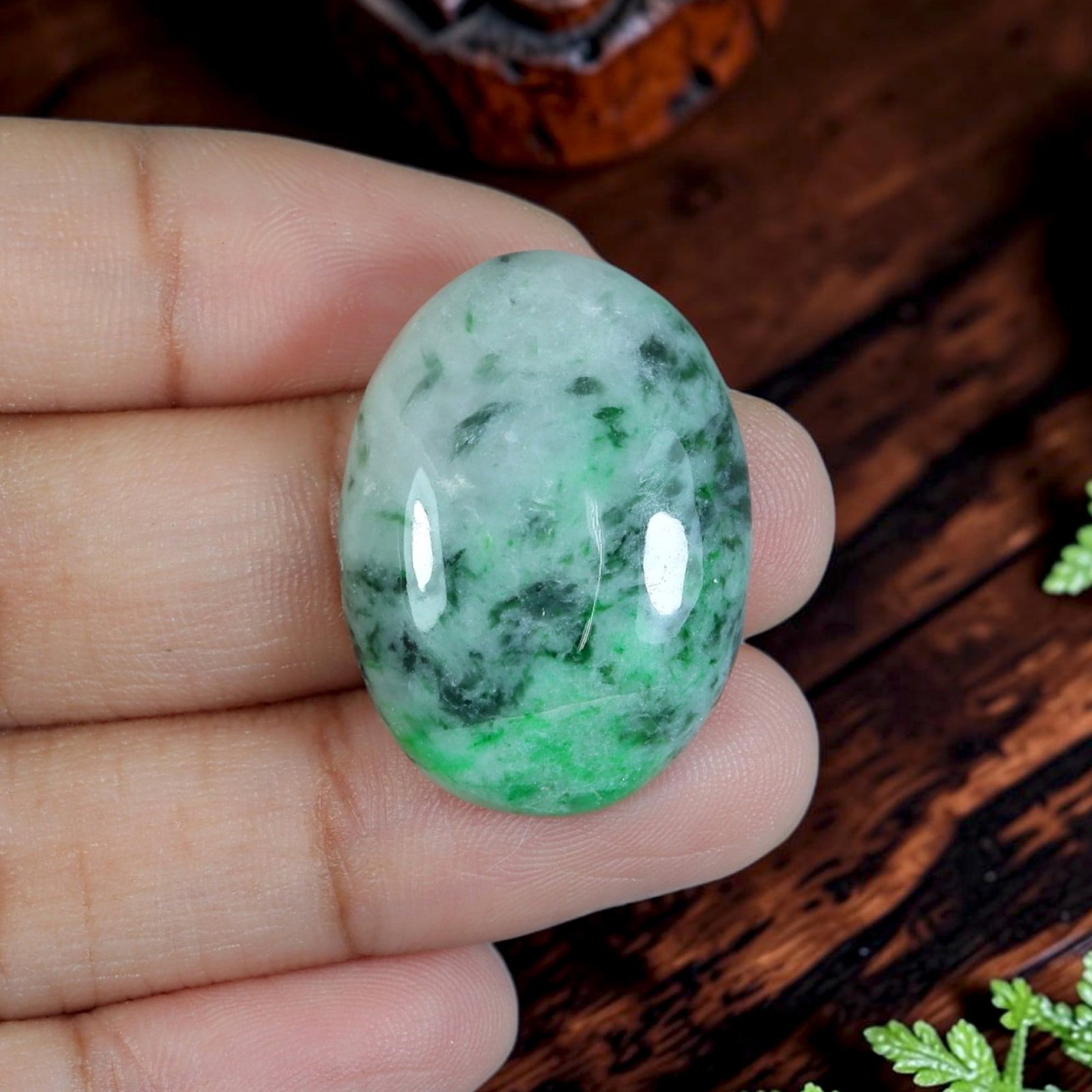 26.38ct Natural Burmese Type A Jadeite Jade Cabochon, 71EB: Formed from untreated natural Burmese Type A jadeite jade, this oval cabochon is precisely lapidary polished with a smoothly domed upper face and flat base designed for custom jewelry setting. The tra