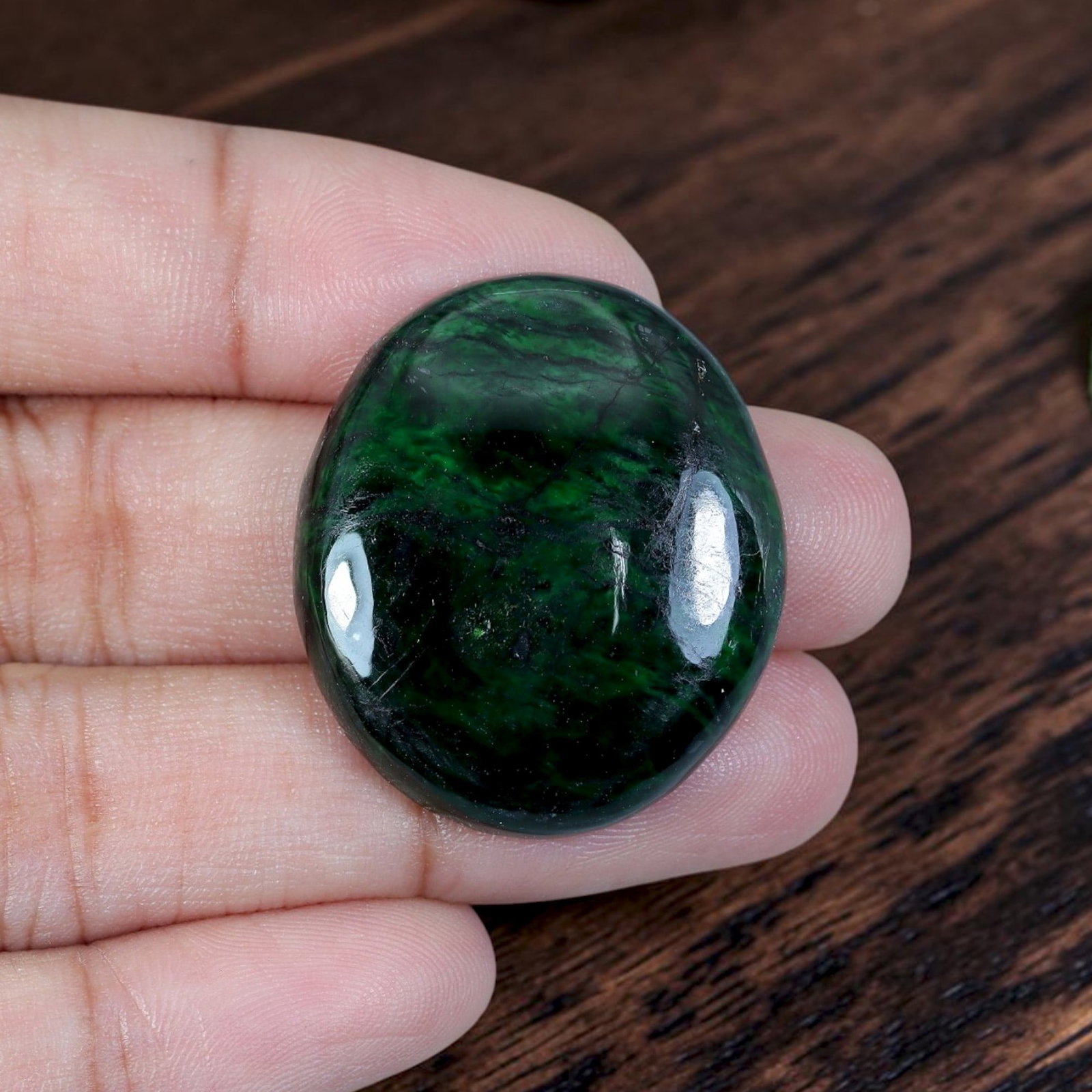 33.81ct Natural Burmese Type A Jadeite Jade Cabochon, 3EC: Polished from untreated natural Burmese Type A jadeite jade, this large rounded thick domed cabochon features plump high-gloss dome and flat base ideal for luxury statement pendant setting. Rich deep 