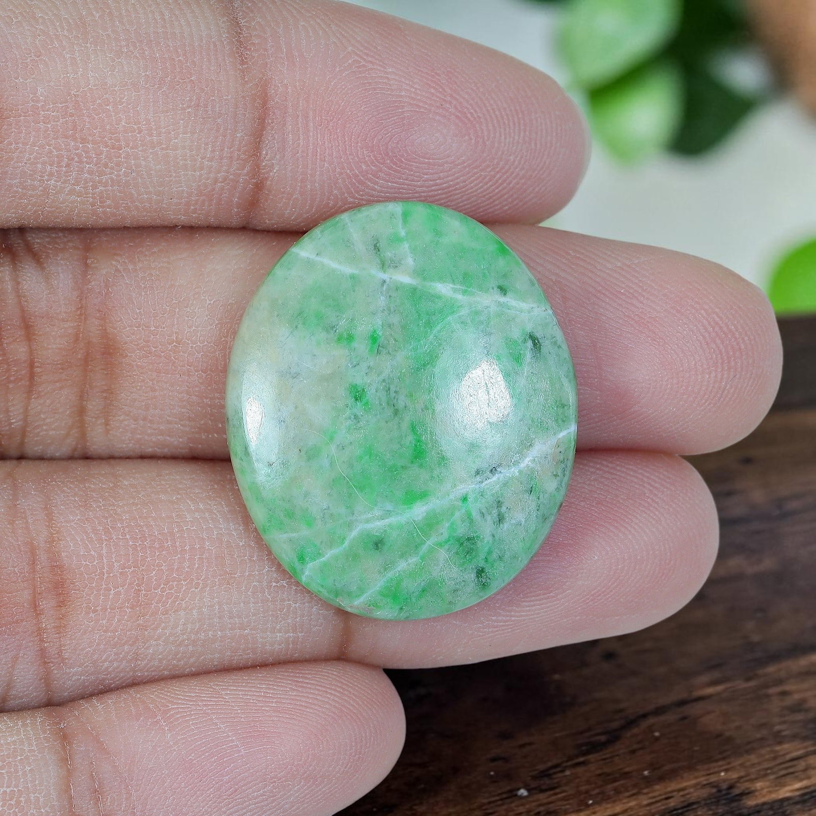 24.93ct Natural Burmese Type A Jadeite Jade Oval Cabochon, 80AP: Polished from untreated natural Burmese Type A jadeite jade, this oval cabochon features plump domed polish and flat base suitable for bold ring or medium-sized pendant setting. Pale milky celadon bas