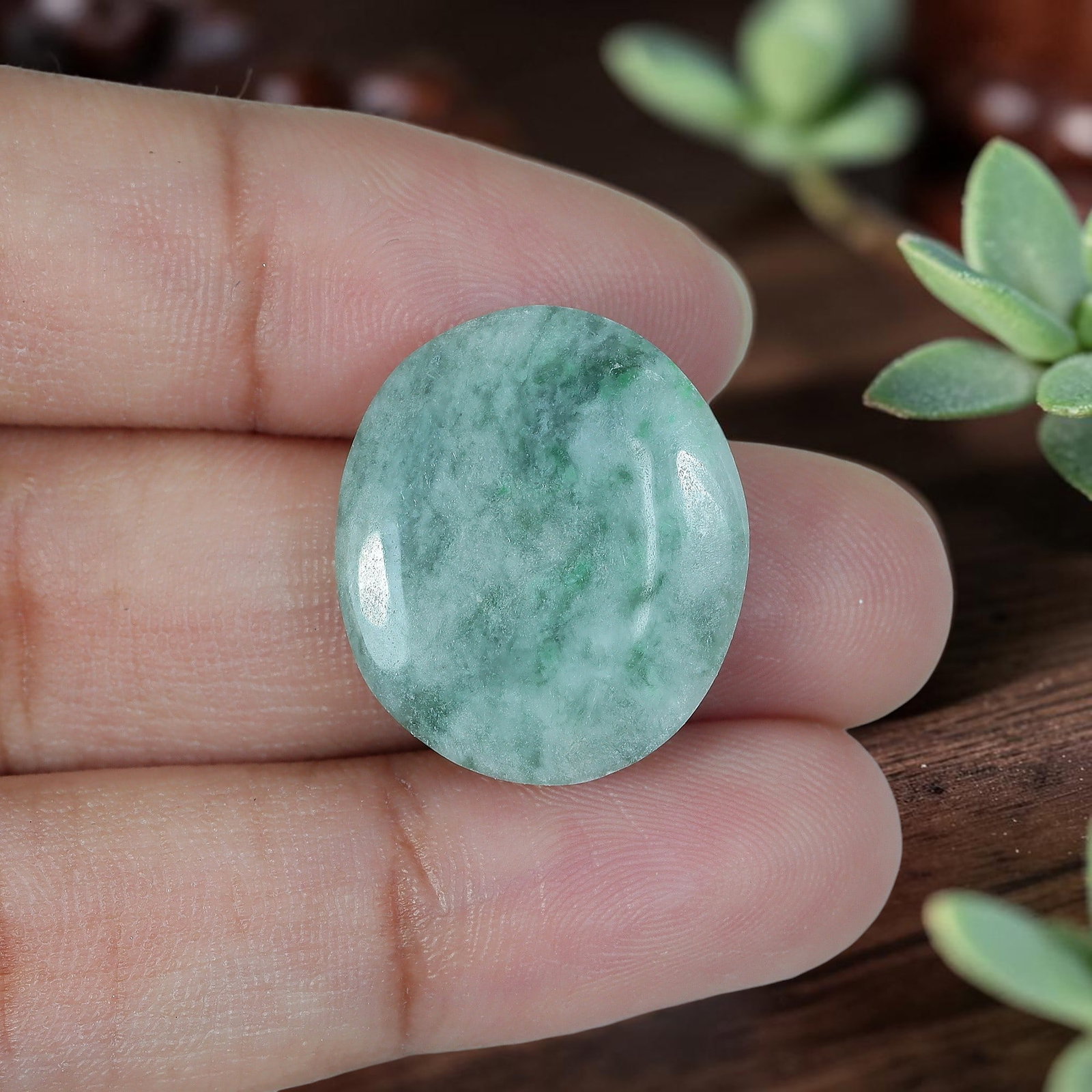 14.52ct Natural Burmese Type A Jadeite Jade Oval Cabochon, 7AR: Polished from untreated natural Burmese Type A jadeite jade, this oval cabochon features plump domed polish and flat base suitable for everyday ring or delicate pendant setting. Pale frosty celadon gr