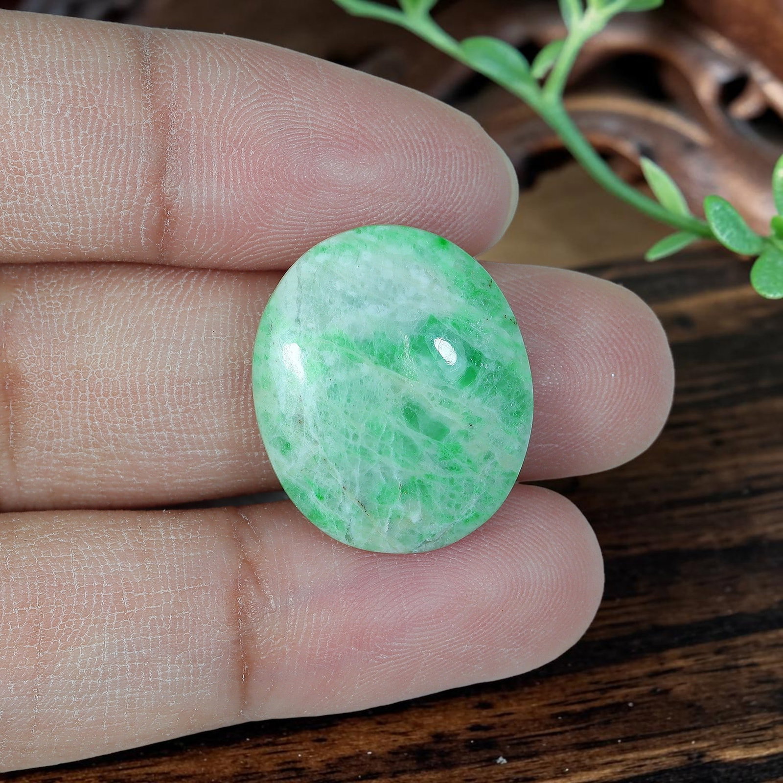 11.77ct Natural Burmese Type A Jadeite Jade Oval Cabochon, 14AR: Polished from untreated natural Burmese Type A jadeite jade, this oval cabochon features shallow domed polish and flat base suitable for delicate daily-wear ring or small pendant setting. Pale milky w
