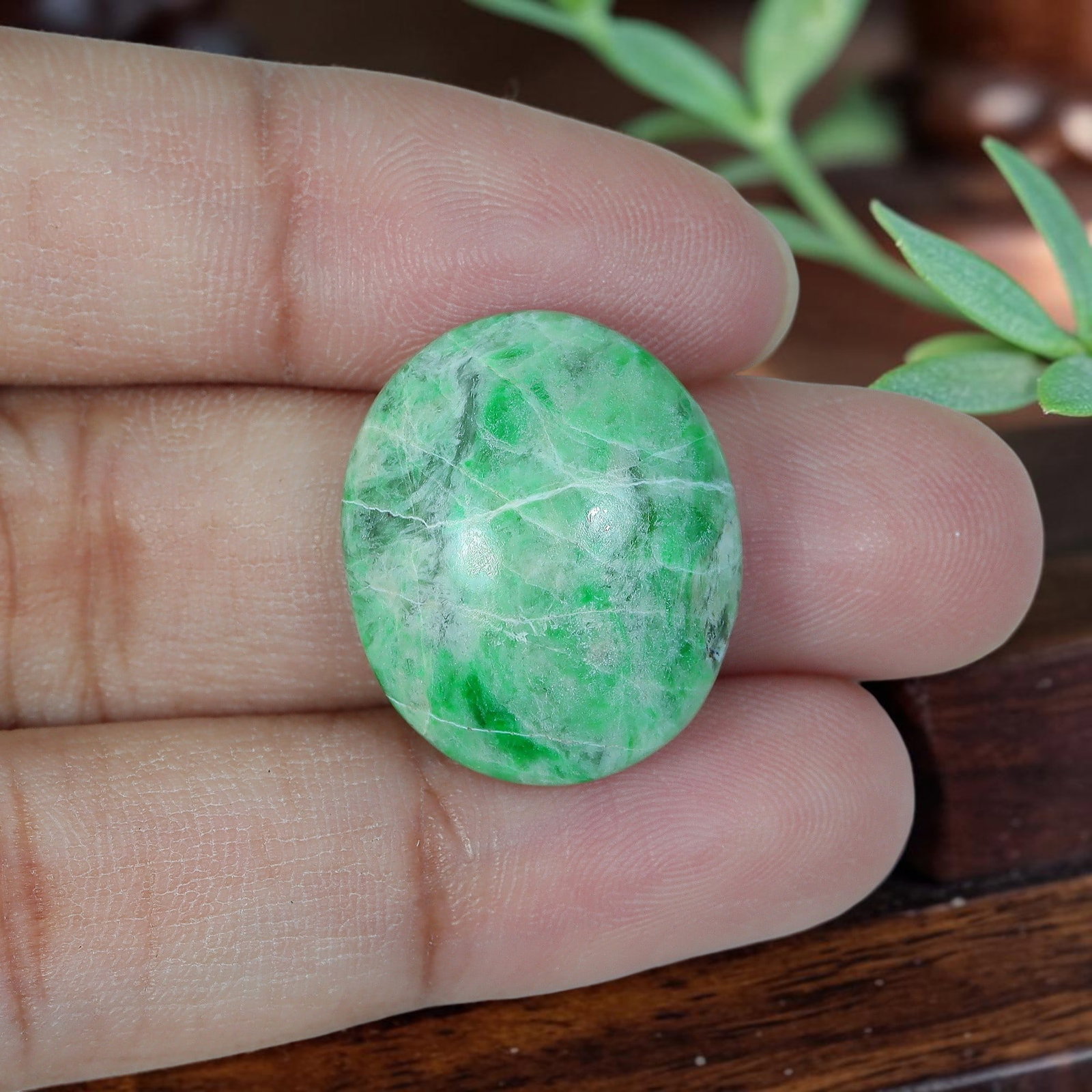 16.47ct Natural Burmese Type A Jadeite Jade Oval Cabochon, 4AR: Polished from untreated natural Burmese Type A jadeite jade, this oval cabochon features plump domed polish and flat base suitable for ring or small pendant setting. Pale milky white-green base matrix