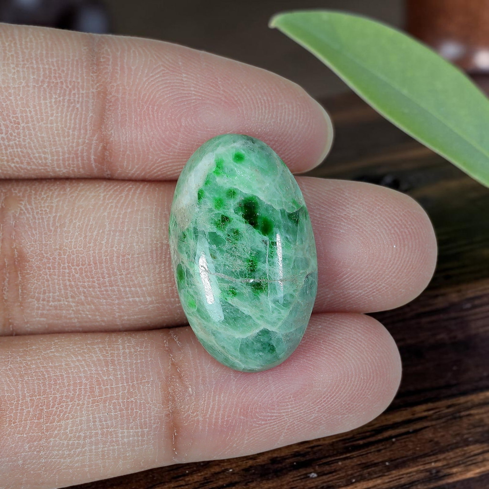 15.92ct Natural Burmese Type A Jadeite Jade Oval Cabochon, 2AR: Polished from untreated natural Burmese Type A jadeite jade, this narrow oval cabochon features plump domed polish and flat base suitable for vertical ring or slim pendant setting. Pale mint green mil