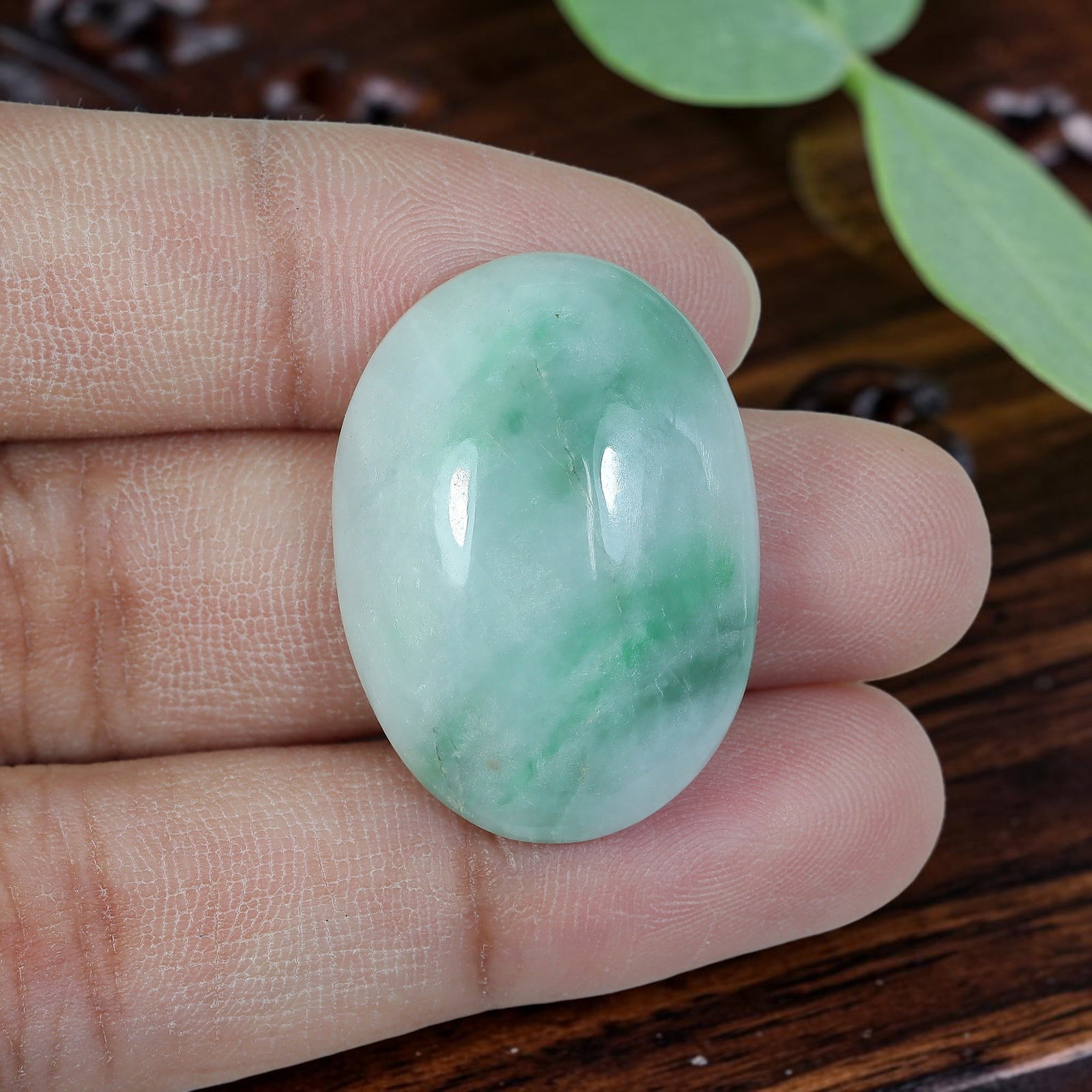34.41ct Natural Burmese Type A Jadeite Jade Oval Cabochon, 93AP: Polished from untreated natural Burmese Type A jadeite jade, this oval cabochon features plump domed polish and flat base suitable for pendant or statement ring setting. Soft milky pale celadon green 