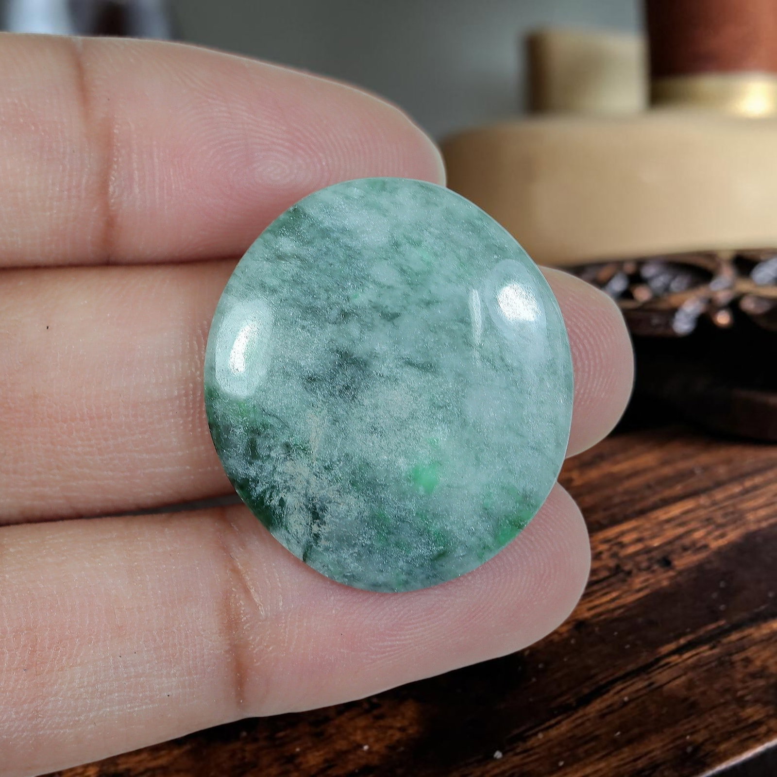20.55ct Natural Burmese Type A Floating Moss Green Jadeite Jade Oval Cabochon, 90AP: Crafted from fully untreated natural Burmese Type A jadeite jade, this wide oval cabochon features a low shallow domed surface paired with a flat base, well-suited for large minimalist rings or elegan