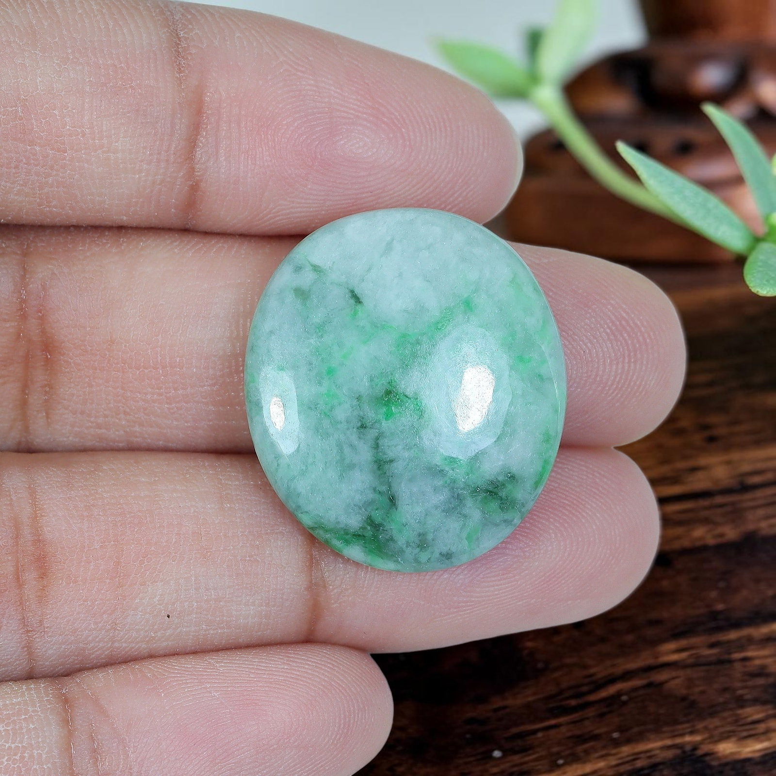 25.33ct Natural Burmese Type A Floral Floating Green Jadeite Jade Oval Cabochon, 82AP: Polished from fully untreated natural Burmese Type A jadeite jade, this well-proportioned oval cabochon features a moderately plump domed top paired with flat base, ideal for eye-catching cocktail rin