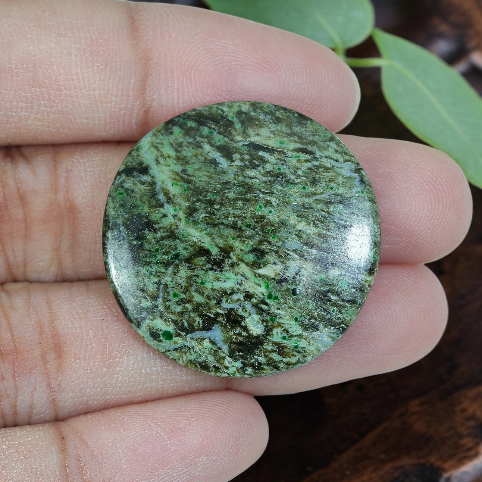 25.86ct Natural Burmese Type A Speckled Moss Green Round Jadeite Jade Cabochon, 86AP: Polished from fully untreated natural Burmese Type A jadeite jade, this wide near-perfect round cabochon features a gentle shallow domed top paired with a flat base, ideal for oversized statement ring