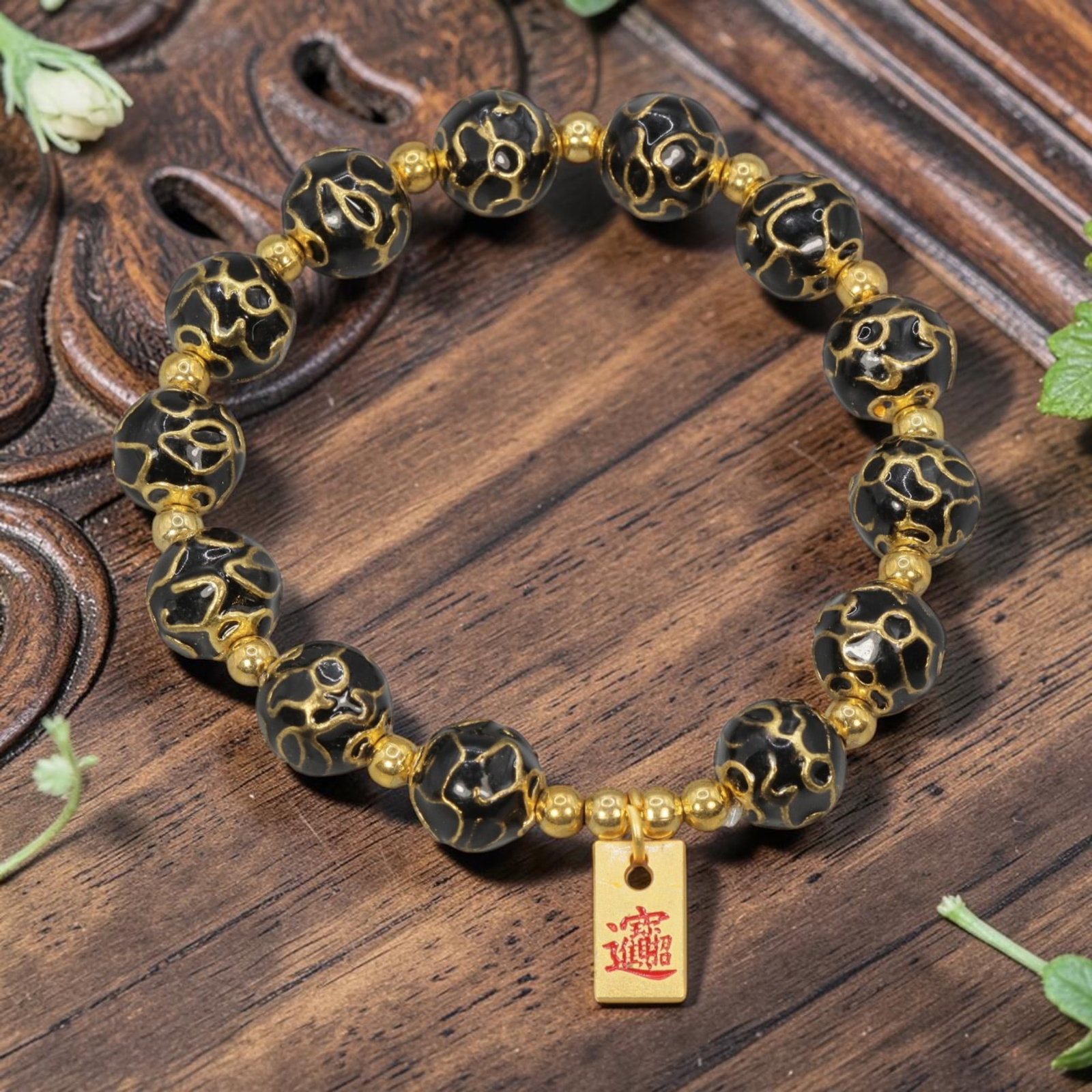A Chinese Cloisonne Enamel Beaded Bracelet - Black Gold-Tone Wealth Charm, 27YJ: This modern Chinese-style bracelet features 10.23mm round cloisonne enamel beads in a deep black hue, each detailed with raised gold-tone swirling patterns. Small smooth gold-tone spacer beads separat