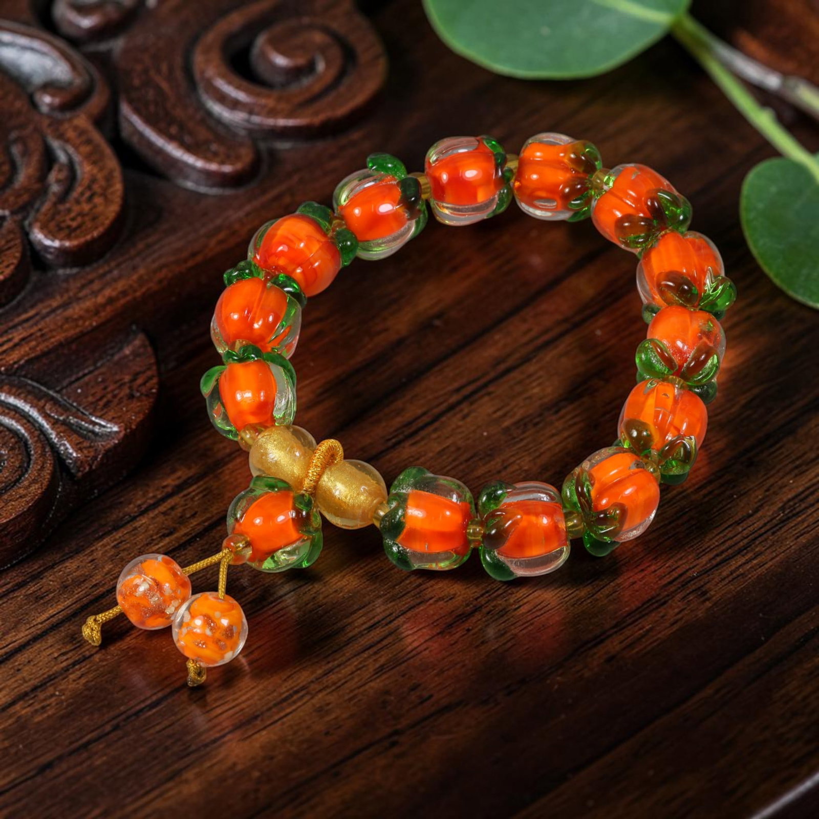 Chinese Persimmon Glass Beaded Bracelet - Fruit Form Lampwork Glass Ornament, 61AR: This strand is composed of hand-sculpted Chinese lampwork glass beads individually shaped into miniature persimmon fruit forms, each featuring translucent clear glass outer casings enclosing vibrant o