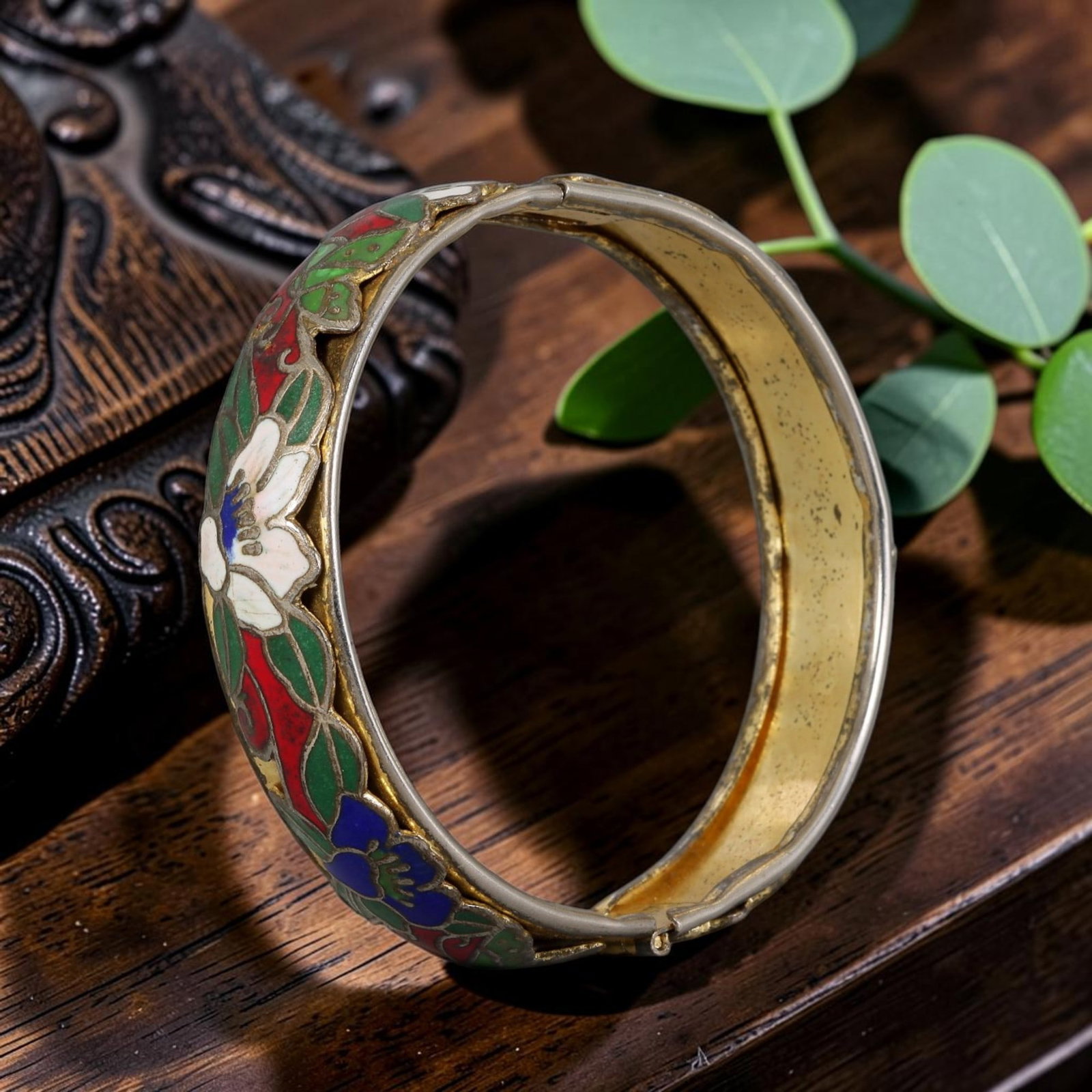 Vintage Chinese Cloisonne Wide Cuff Bangle - Red White Floral Gilded Hinged Bracelet, 27AS: Crafted from brass substrate with traditional Chinese cloisonne raised filigree wire artistry, this extra wide hinged cuff bangle showcases a deep red enamel backdrop decorated with dimensional white,