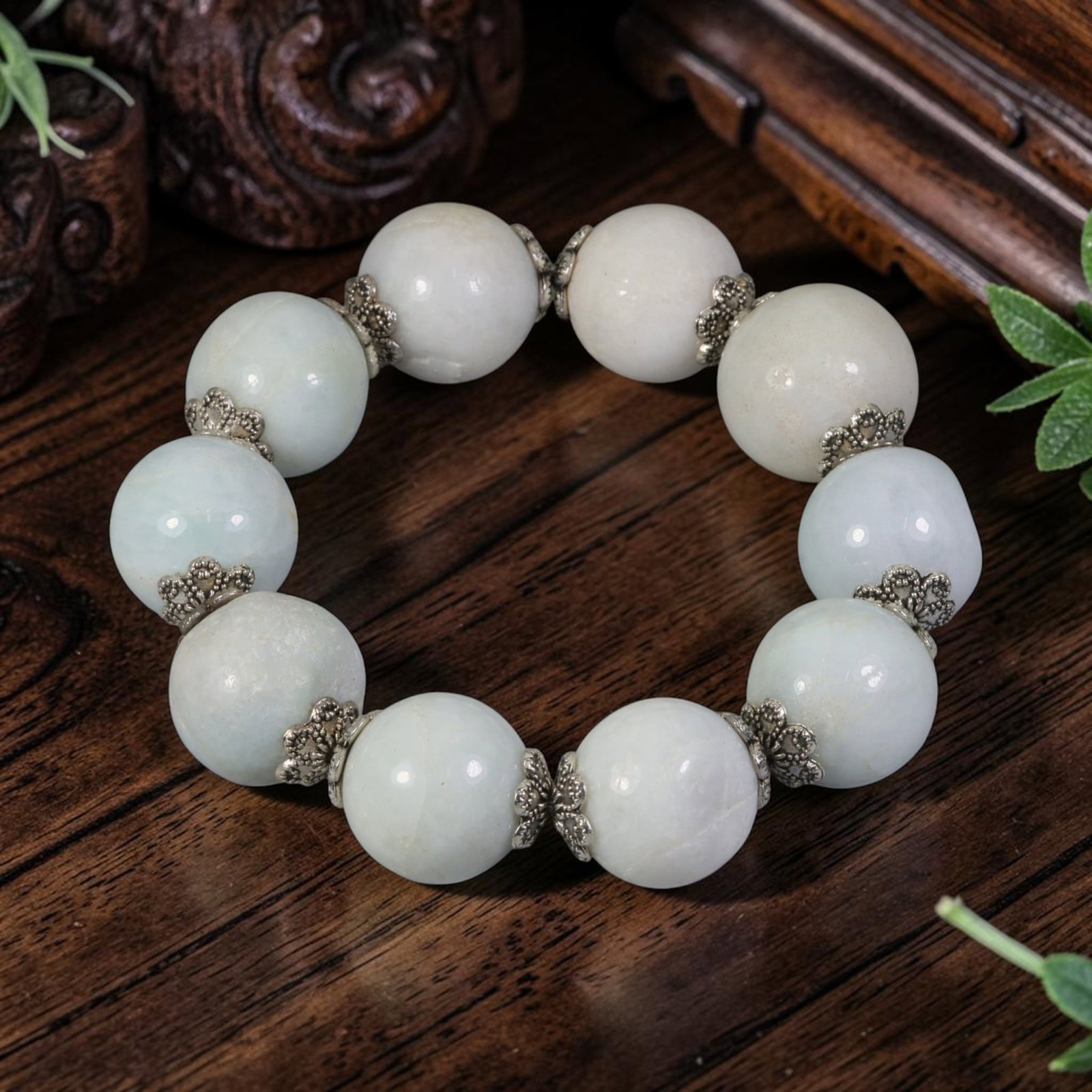 Burmese Type A Jadeite Beaded Bracelet - Pale Celadon Stone Spherical Ornament, 86AR: This bracelet is constructed from fully polished spherical beads of natural Burmese Type A jadeite jade, exhibiting a soft pale celadon translucent hue with subtle faint natural mineral veining visibl