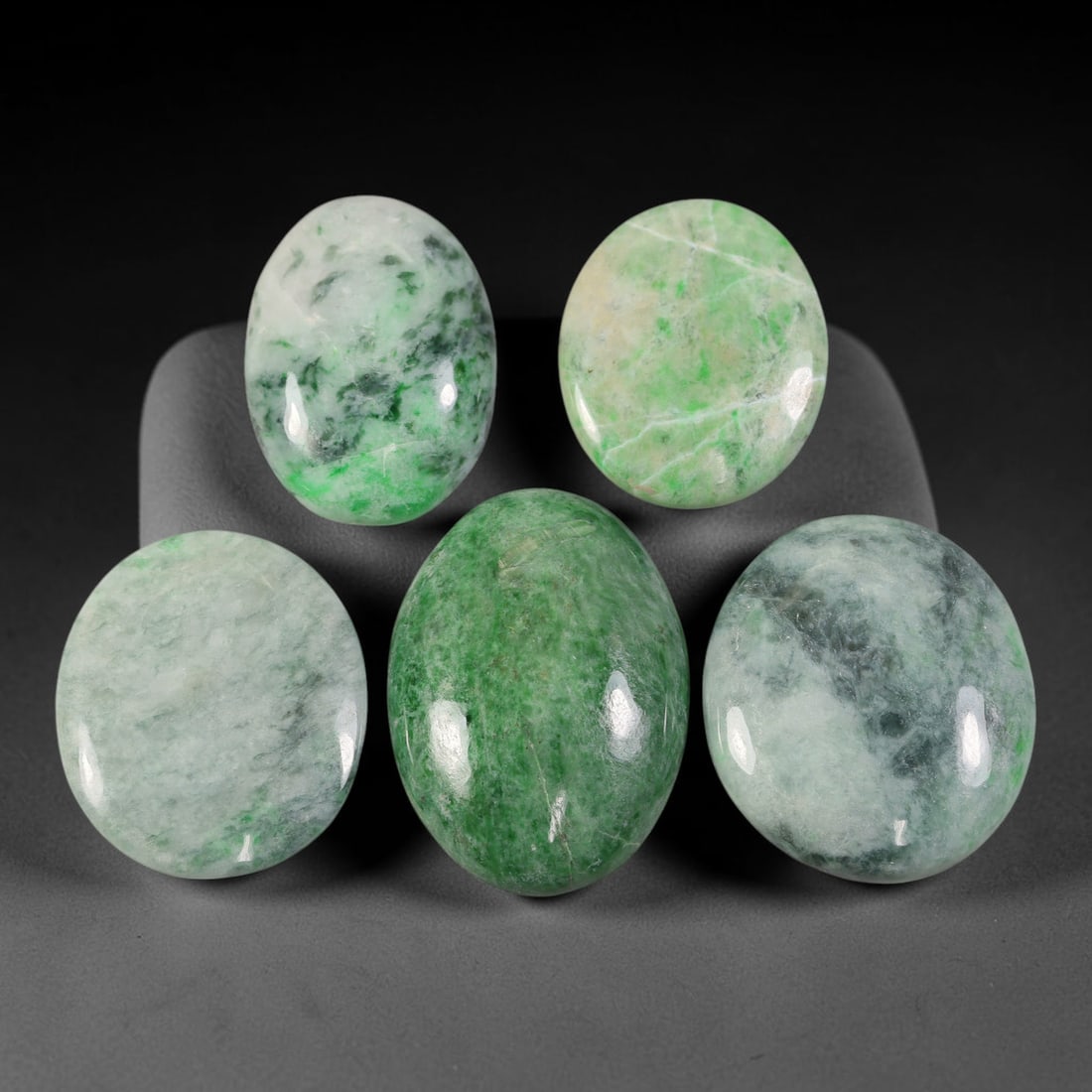 Lot of 5pcs 159ct Natural Burmese Type A Emerald Floating Cloud Jadeite Jade Cabochons, 56AV: This wholesale bulk lot contains 5 fully untreated natural Burmese Type A jadeite jade cabochons with assorted oval and rounded silhouettes, total combined weight of 159ct, with the largest stone meas