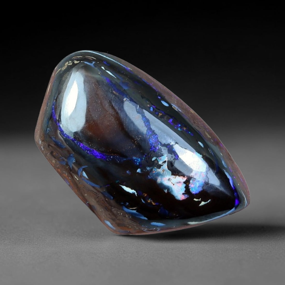 12.91ct Natural Australian Queensland Matrix Boulder Opal Freeform Barrel Cabochon, 47FB: Hand polished asymmetrical freeform barrel cabochon crafted from natural Queensland matrix boulder opal, featuring deep dark chocolate ironstone matrix with concentrated luminous pools of electric vio