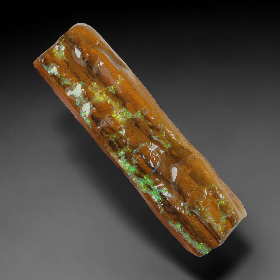 32.63ct Natural Australian Queensland Boulder Opal Sliced Slab Cutting Rough, 25AX: Natural sliced slab rough of Queensland boulder opal cutting grade, featuring rich color ironstone matrix with patterns. The face clearly reveals extensive opal veining and pocket formations running t