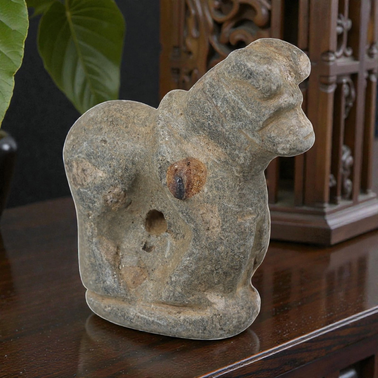 Antique Medieval Silk Road Stone Effigy Artifact, 88AN: Carved from weathered grey stone, this artifact depicts a stylized quadruped figure in a seated pose, characteristic of medieval Silk Road craftsmanship. The piece features simplified facial and body 