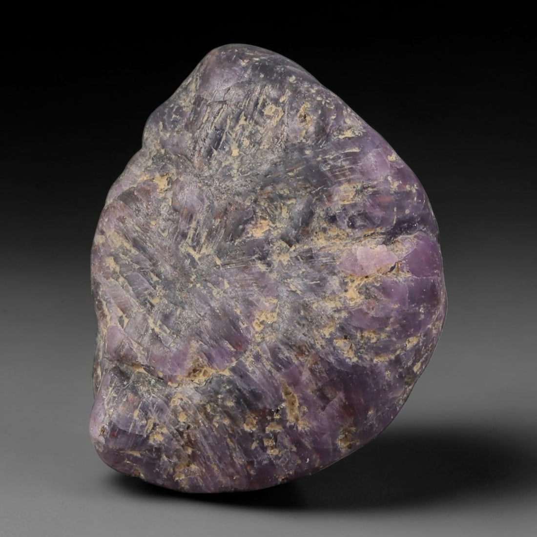 48.84ct Natural Unheated Sri Lankan Purplish Blue Sapphire Rough, 30FC: This natural corundum rough is an unheated purplish blue sapphire sourced from Sri Lankan alluvial gem deposits, featuring an irregular natural native form with residual pale yellow-brown mineral matr