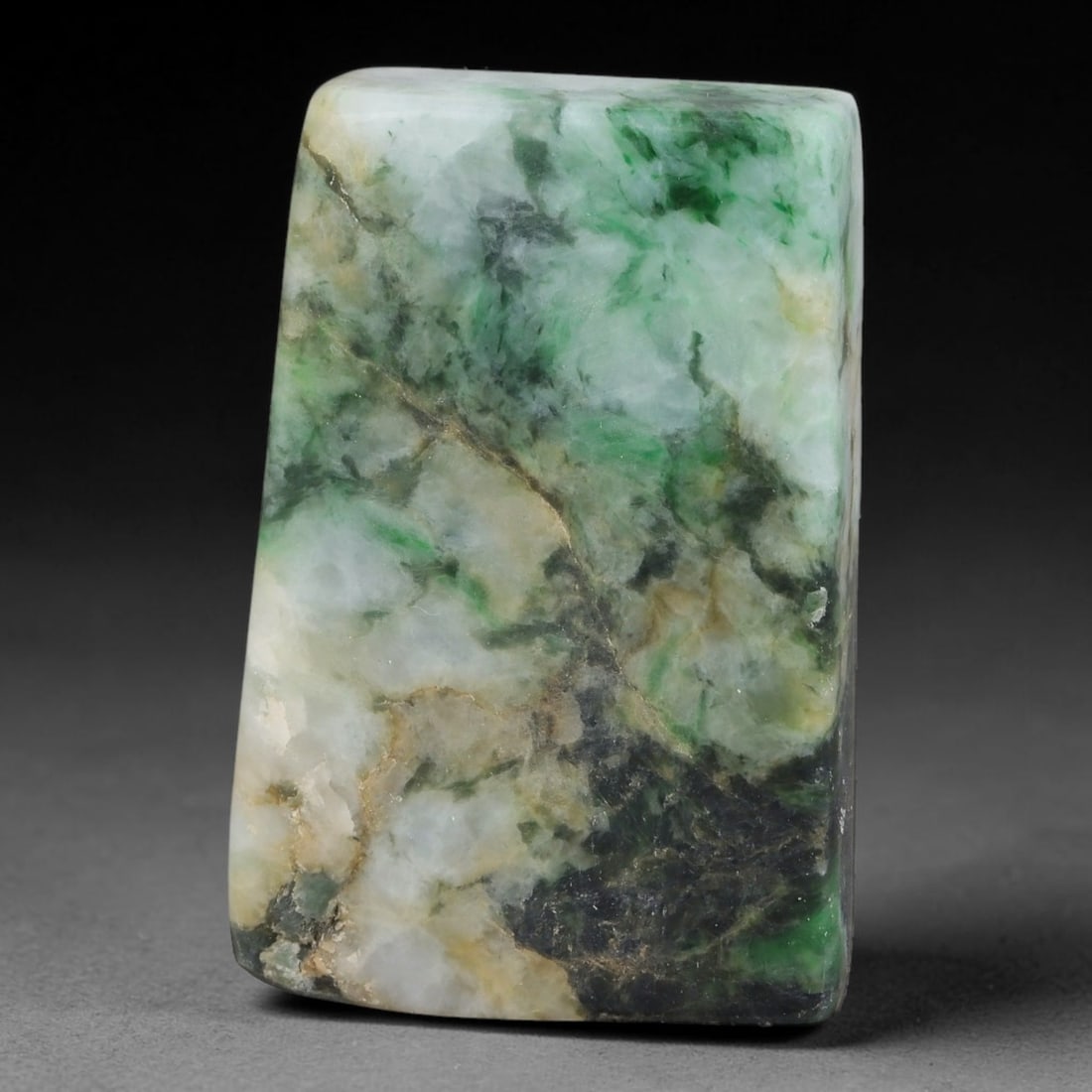 221ct Natural Type A Burmese Jadeite Jade Sliced Rough, 7FB: This specimen is a sliced rough block of natural Type A Burmese jadeite jade. The interior displays natural colour zoning with visible mineral veining and crystalline patterns typical of unprocessed j