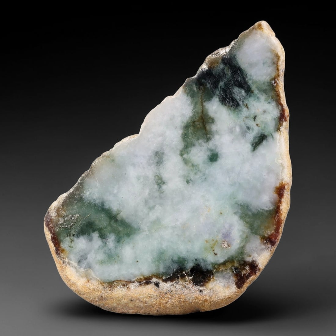 605ct Natural Type A Burmese Mossy Green Cloud Pattern Jadeite Jade Sliced Rough, 2FA: This specimen is a natural sliced rough piece of untreated Type A Burmese jadeite, retaining continuous weathered tan-brown outer rind along its irregular perimeter, with a polished cut interior showc