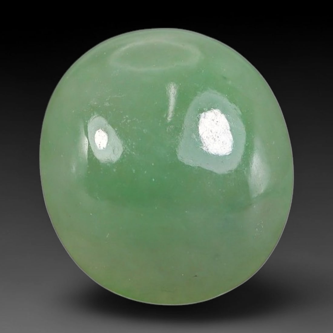 3.93ct Natural Burmese Type A Apple Green Jadeite Jade Cabochon, 90FA: This single loose natural Burmese Type A apple green jadeite jade cabochon, completely untreated, free of artificial dye, bleaching, or resin filling, preserving the original natural mineral crystal s