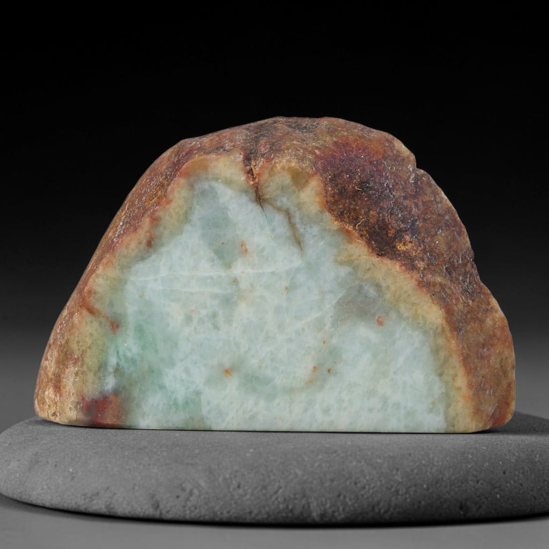 241ct Natural Type A Burmese Jadeite Jade Sliced Rough, 76FB: This specimen is a sliced rough block of natural Type A Burmese jadeite jade. The interior displays natural colour zoning with visible mineral veining and crystalline patterns typical of unprocessed j