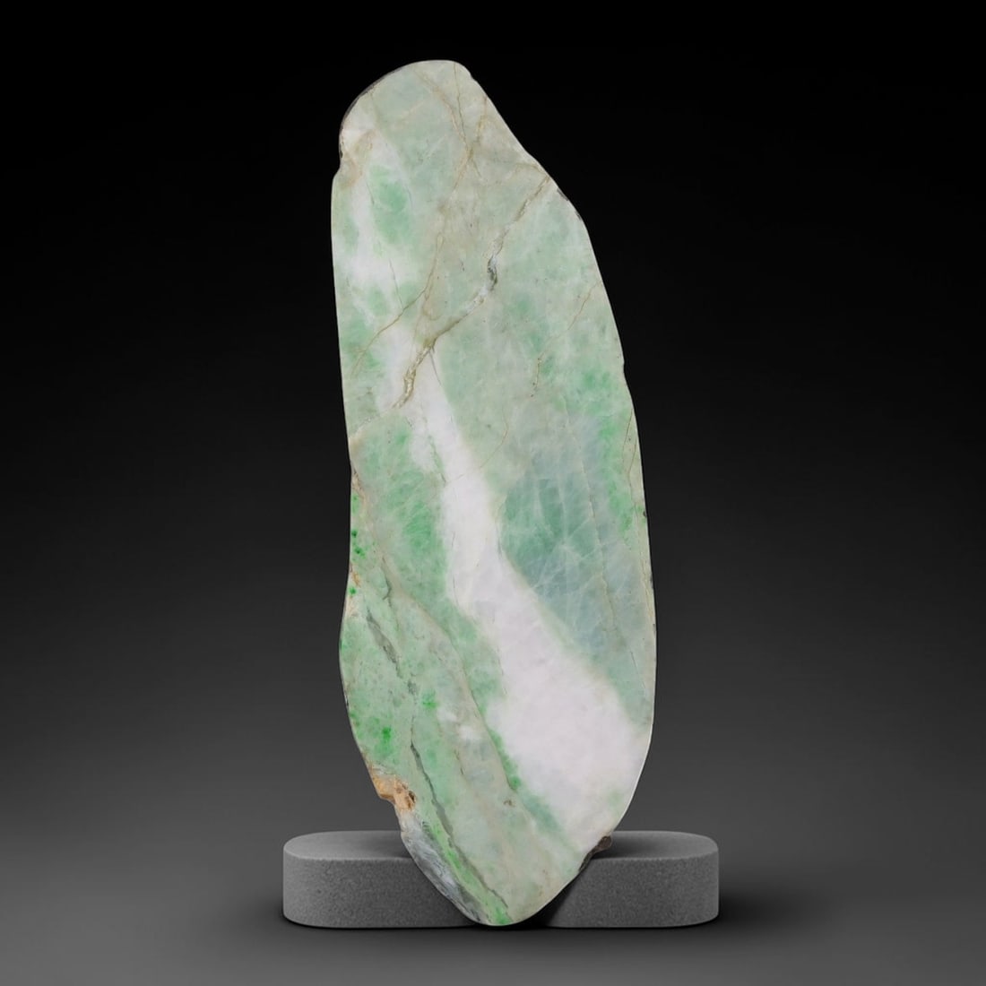 285ct Natural Type A Burmese Jadeite Jade Sliced Rough, 46AZ: This specimen is a sliced rough block of natural Type A Burmese jadeite jade. The interior displays natural colour zoning with visible mineral veining and crystalline patterns typical of unprocessed j