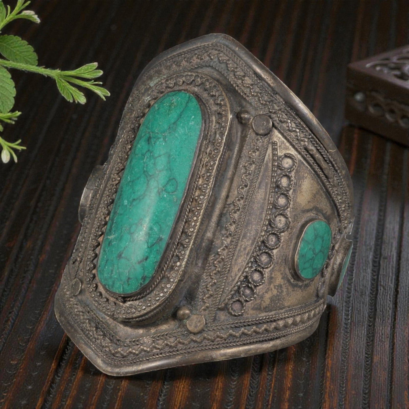 A Vintage Central Asian Silver-Plated Turquoise Cuff Bracelet, 71AH: A handcrafted vintage cuff bracelet, measuring approximately 6 cm in width, showcasing traditional Central Asian (Afghan/Turkmen) tribal jewelry design. The piece features a silver-plated metal base, 