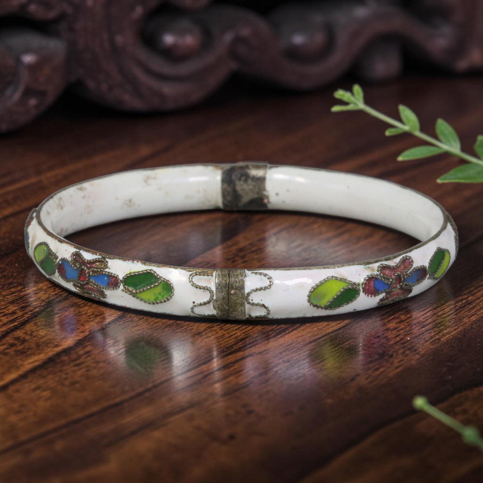 Vintage Chinese Cloisonne Bangle - White Floral Enamel Bracelet, 84FD: Built upon a gilded metal foundation with classic Chinese cloisonne twisted wire filigree craftsmanship, this hinged bangle features an opaque white enamel base adorned with repeating stylized floral 