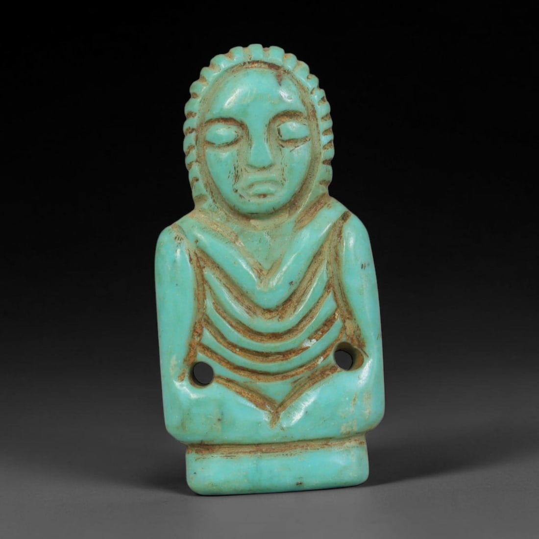Antique Coptic Egyptian Style Turquoise Stone Human Bust Zoomorphic Amulet, 74AA: Hand-carved devotional talisman of natural turquoise stone crafted in antique Coptic Egyptian human bust form, measuring 2.8cm x 1.4cm. The miniature carving showcases closed serene eyes, incised ridg
