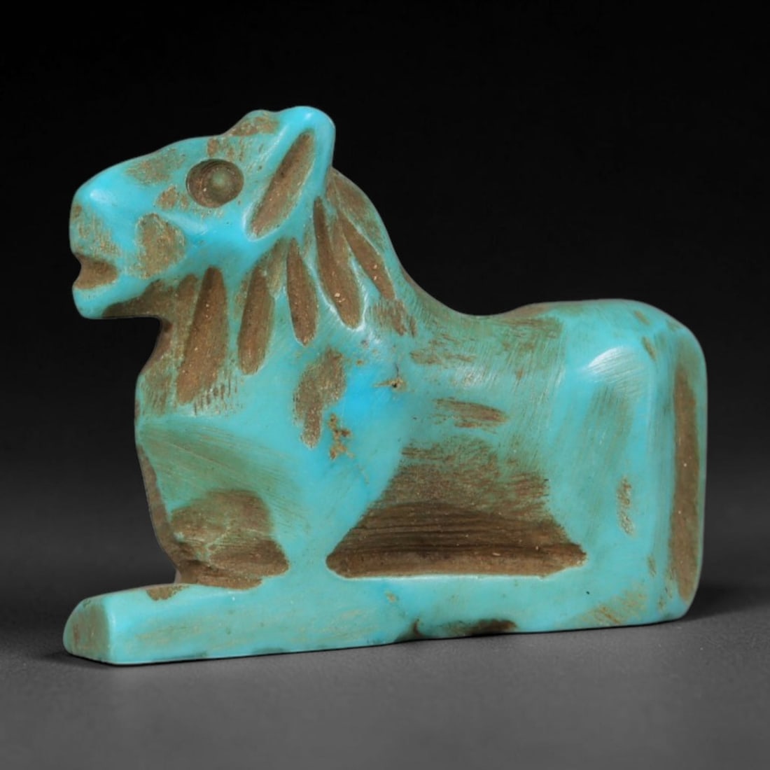 Antique Coptic Egyptian Style Turquoise Stone Feline Zoomorphic Amulet, 76AA: Hand-carved zoomorphic talisman made of natural turquoise stone in antique Coptic Egyptian recumbent feline design, measuring 1.7cm x 1.5cm. The miniature carving depicts a stylized resting cat with i