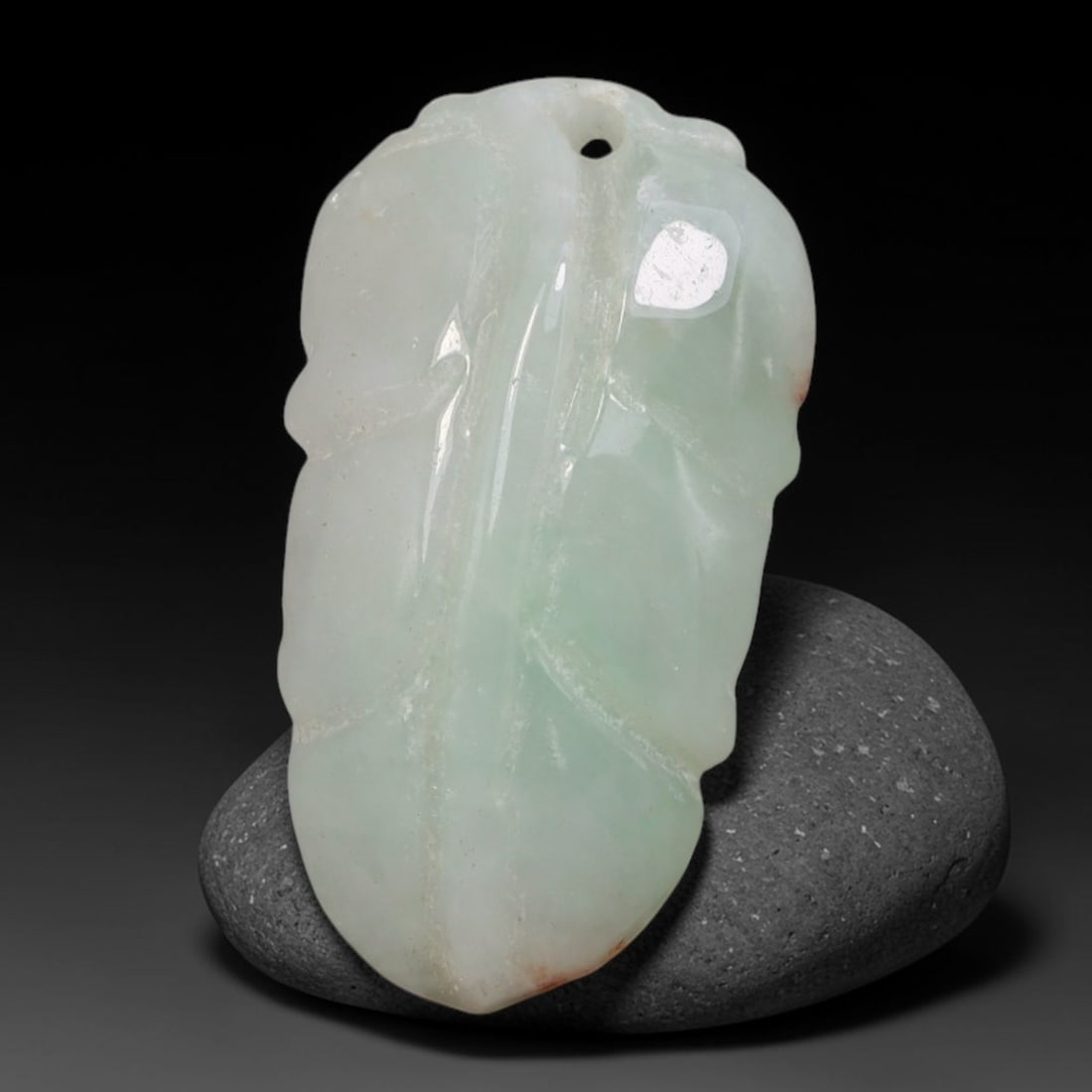 Natural Vintage Burmese Type A Jadeite Jade Floating Green Leaf Pendant, 58AA: Hand-carved vintage wearable pendant crafted from untreated natural Burmese Type A jadeite jade, measuring 3cm x 1.6cm. Sculpted into a classic full leaf silhouette symbolizing prosperity and thriving