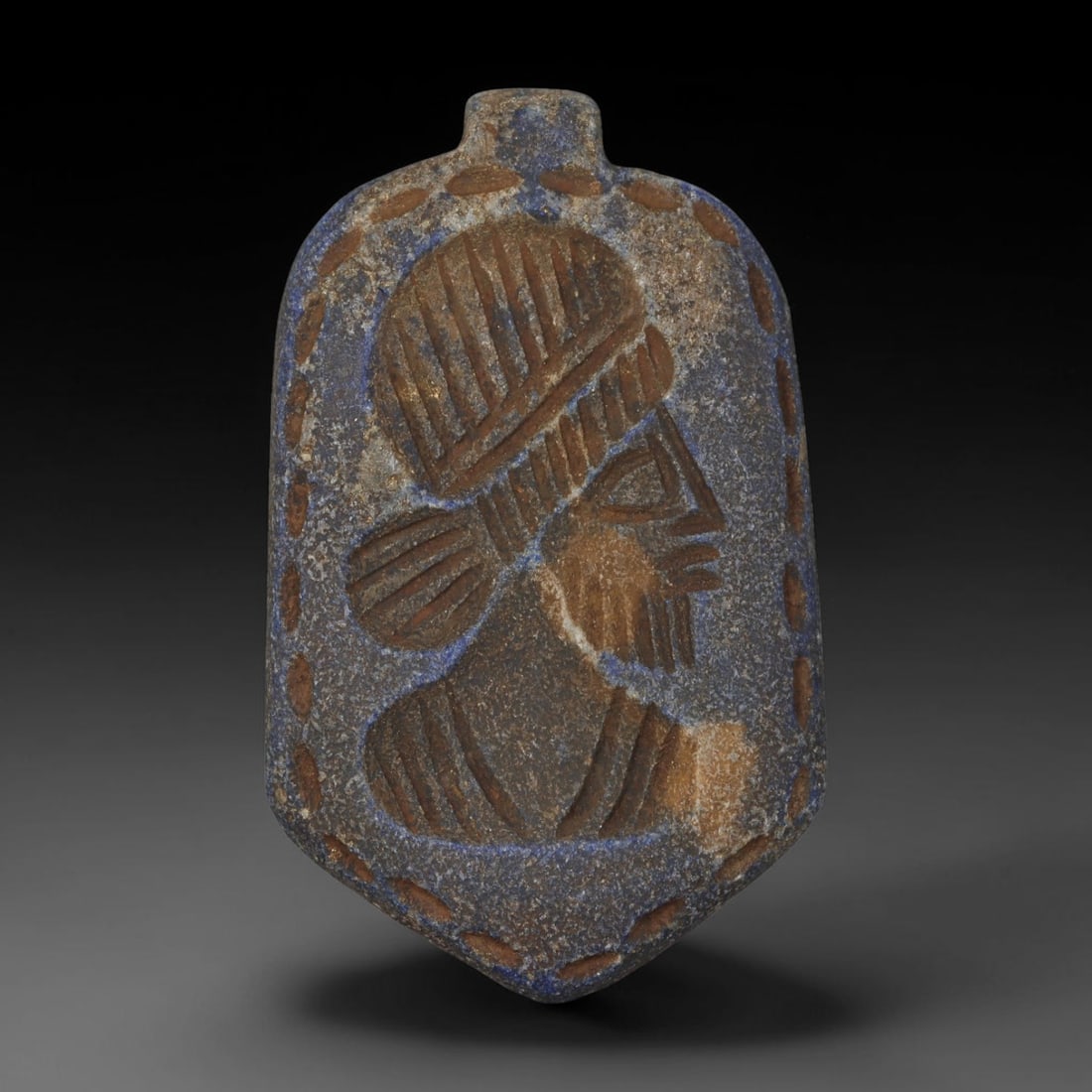 Ancient Sasanian Lapis Lazuli Hand Carved Amulet, 70AP: Antique wearable protective amulet fully carved from solid natural lapis lazuli stone, originating from the historic Sasanian Empire cultural sphere. Lapis lazuli was an immensely valued sacred stone 