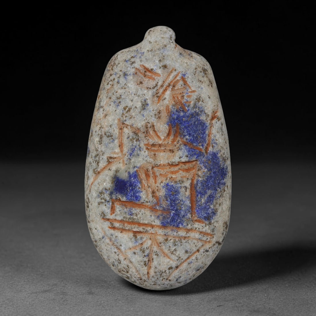 Ancient Sasanian Lapis Lazuli Hand Carved Amulet, 66AP: Antique wearable protective amulet fully carved from solid natural lapis lazuli stone, originating from the historic Sasanian Empire cultural sphere. Lapis lazuli was an immensely valued sacred stone 