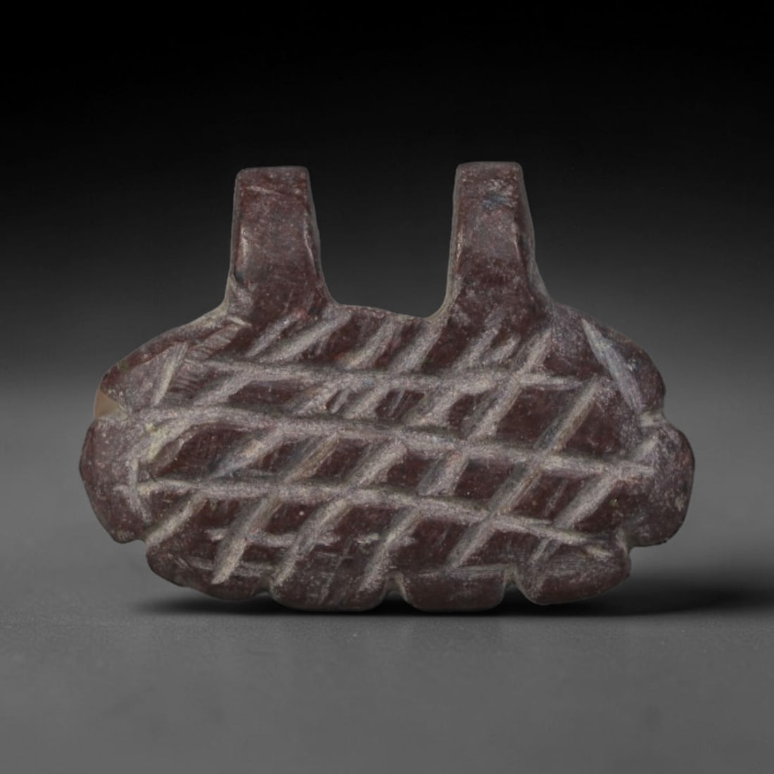 Ancient Egyptian Hand Carved Steatite Protective Amulet, 90AP: Miniature antique wearable talisman hand-fashioned from natural steatite soft stone, measuring 1.2cm, originating from ancient Egyptian Nile Valley craft and devotional traditions. Steatite was a core