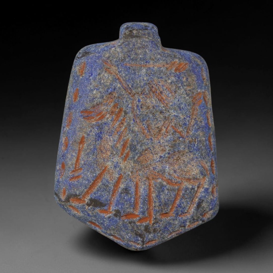 Ancient Sasanian Lapis Lazuli Hand Carved Amulet, 68AP: Antique wearable protective amulet fully carved from solid natural lapis lazuli stone, originating from the historic Sasanian Empire cultural sphere. Lapis lazuli was an immensely valued sacred stone 