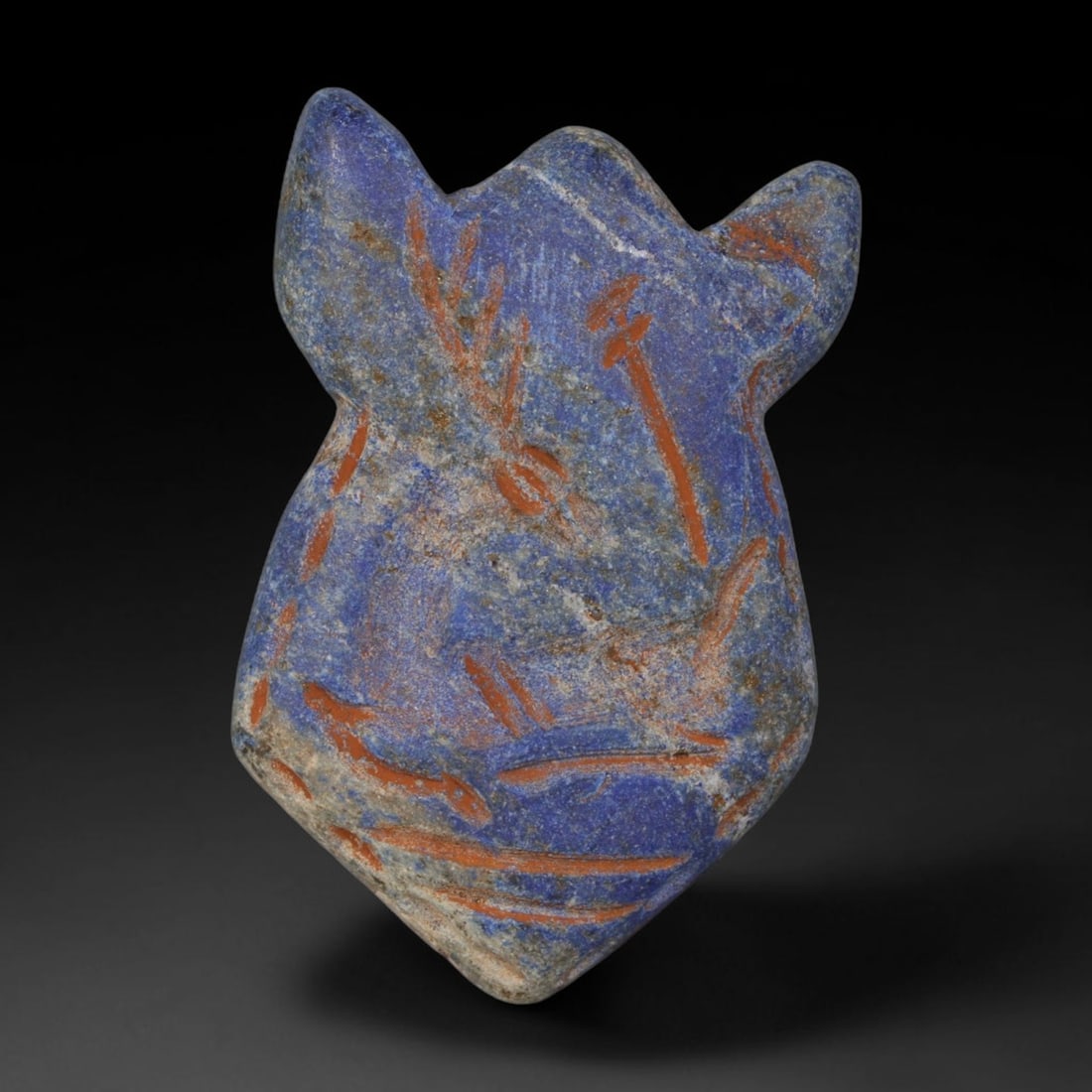 Ancient Sasanian Lapis Lazuli Hand Carved Amulet, 65AP: Antique wearable protective amulet fully carved from solid natural lapis lazuli stone, originating from the historic Sasanian Empire cultural sphere. Lapis lazuli was an immensely valued sacred stone 
