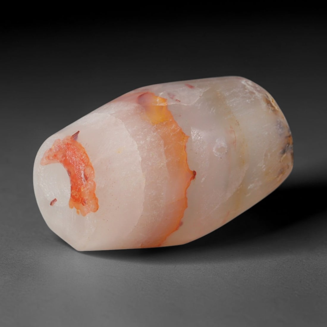 Ancient Canaanite & Phoenician Cultures Banded Agate Barrel Bead (3000-300 BCE), 37AD: This antique banded agate barrel bead originates from the Canaanite & Phoenician Cultures, legendary Levantine maritime traders who crafted and exported agate beads across the entire Mediterranean bas
