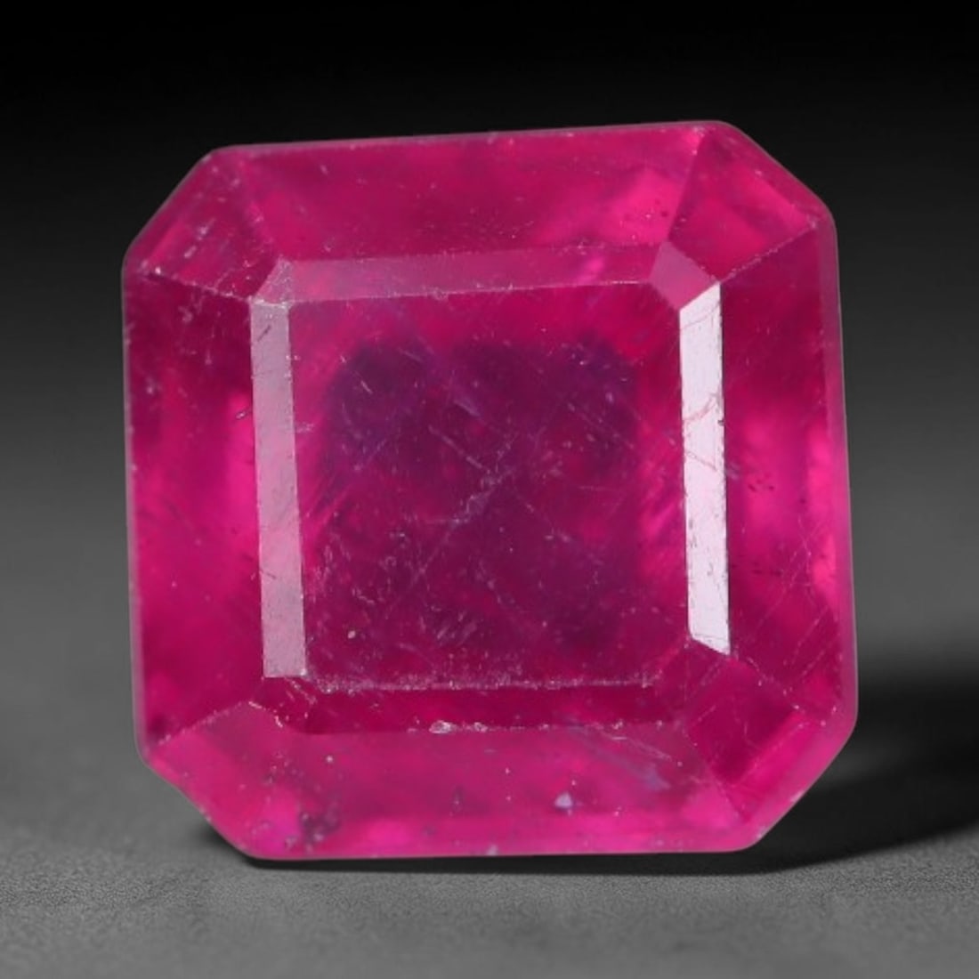 1.70 Carats Natural Madagascar Vivid Fuchsia Red Heated Ruby Loose Gemstone, 76AG: This vivid fuchsia red Madagascar ruby displays rich saturated red tone with subtle natural internal mineral traces that showcase genuine earth-grown character, measured at 6.1x4.1mm, the intense warm