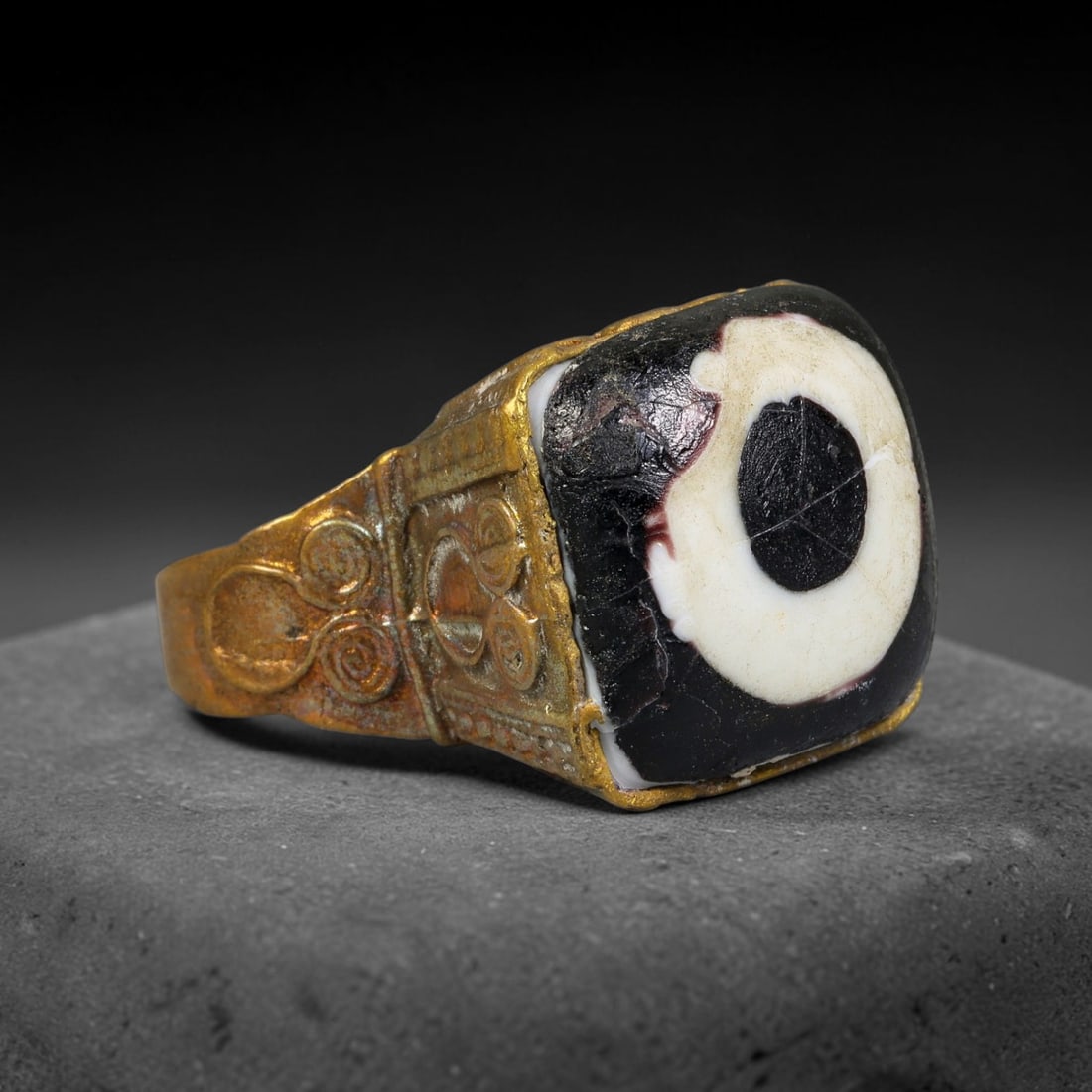 Antique Qajar Dynasty Copper Alloy Ring Set With Banded Glass Bead Cabochon, 63AC: Historic wearable signet ring crafted from textured copper alloy metal, sized to US ring size 9, originating from Qajar Persian artistic and adornment traditions of late medieval Iran. Copper alloy wa