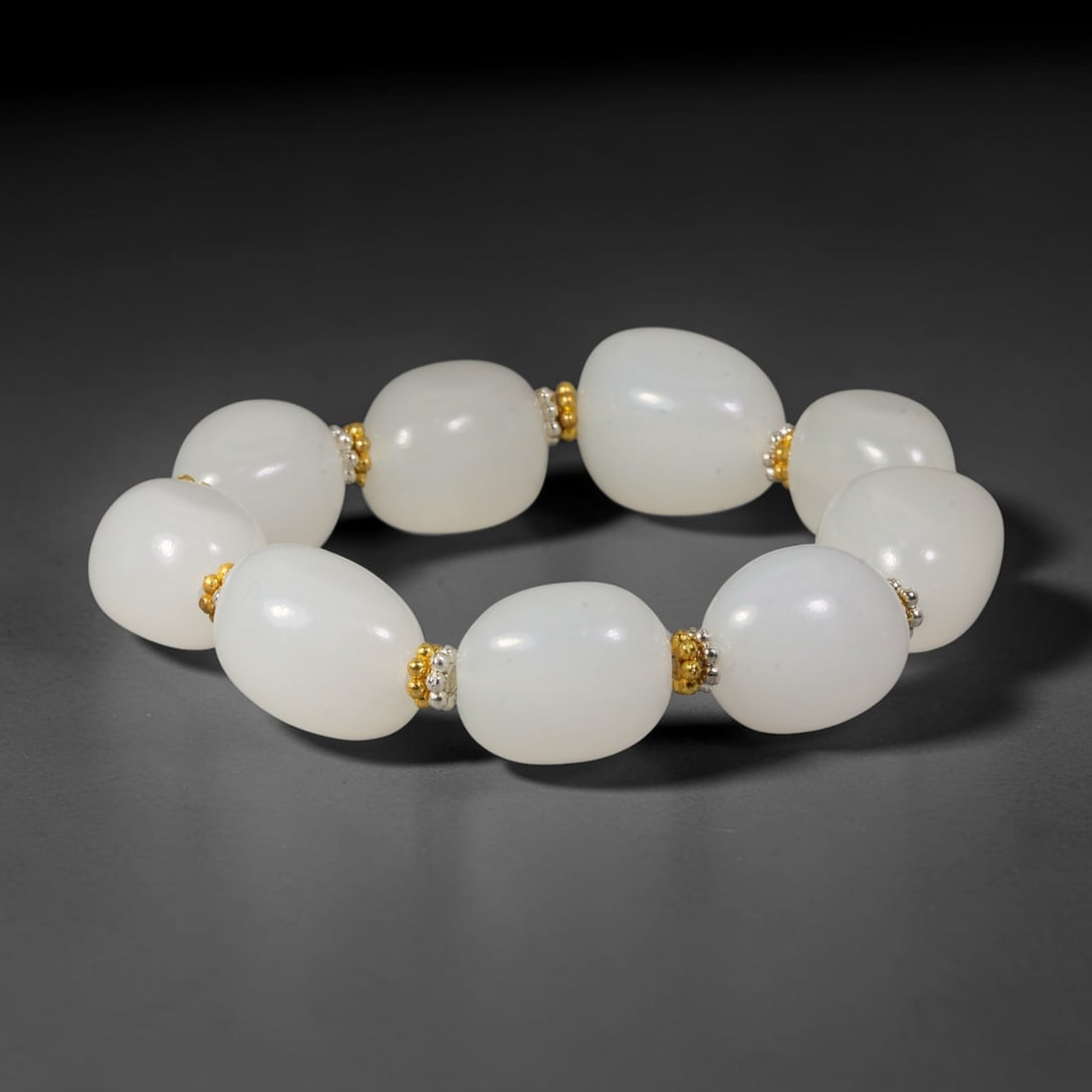Natural Chinese Hetian White Nephrite Jade Large Pebble Bracelet, 12AB: Handcrafted bracelet featuring oversized polished natural Xinjiang Hetian white nephrite river pebble beads, each measuring approx 21mm in dimension. Smooth water-worn freeform jade stones display uni