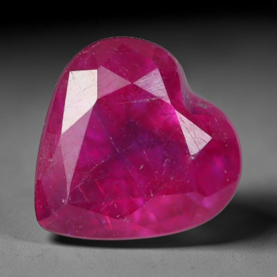 1.01 Carats Natural Madagascar Vivid Fuchsia Red Heated Ruby Loose Gemstone, 72AG: This vivid fuchsia red Madagascar ruby displays rich saturated red tone with subtle natural internal mineral traces that showcase genuine earth-grown character, measured at 5.9x3.7mm, the intense warm