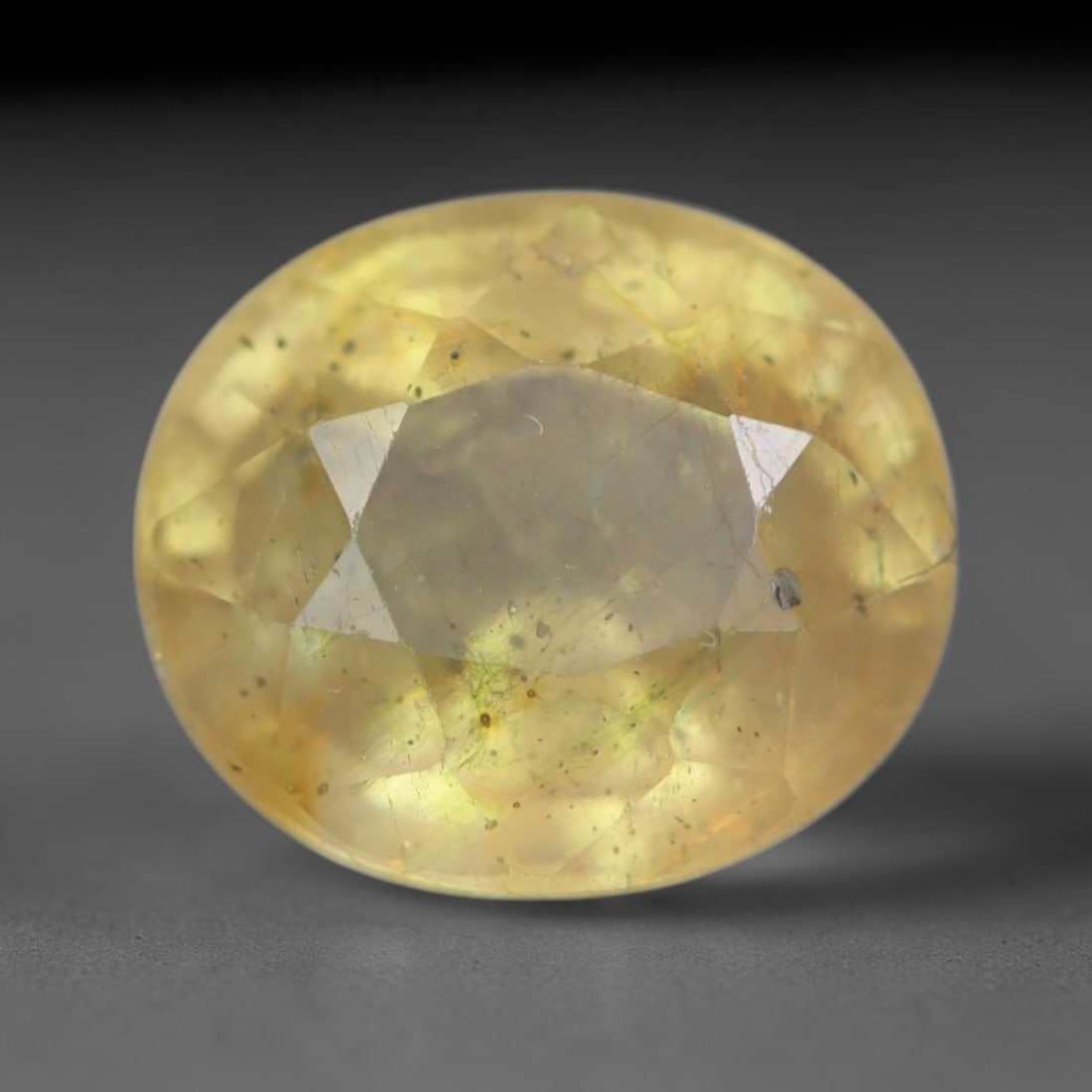 2.61 Carats Natural African Bright Lemon Yellow Sapphire Loose Gemstone, 30AG: This vivid lemon yellow sapphire radiates warm saturated golden hue with crisp faceted light dispersion, measured at 8.1x7x5mm, fine natural internal needle inclusions add authentic organic character 