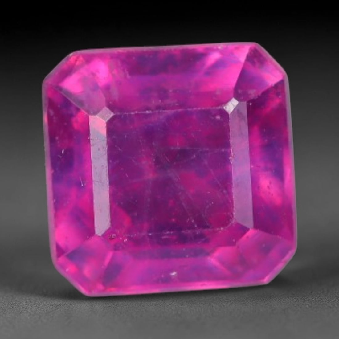 0.87 Carats Natural Madagascar Vivid Fuchsia Red Heated Ruby Loose Gemstone, 74AG: This vivid fuchsia red Madagascar ruby displays rich saturated red tone with subtle natural internal mineral traces that showcase genuine earth-grown character, measured at 5x3.4mm, the intense warm c