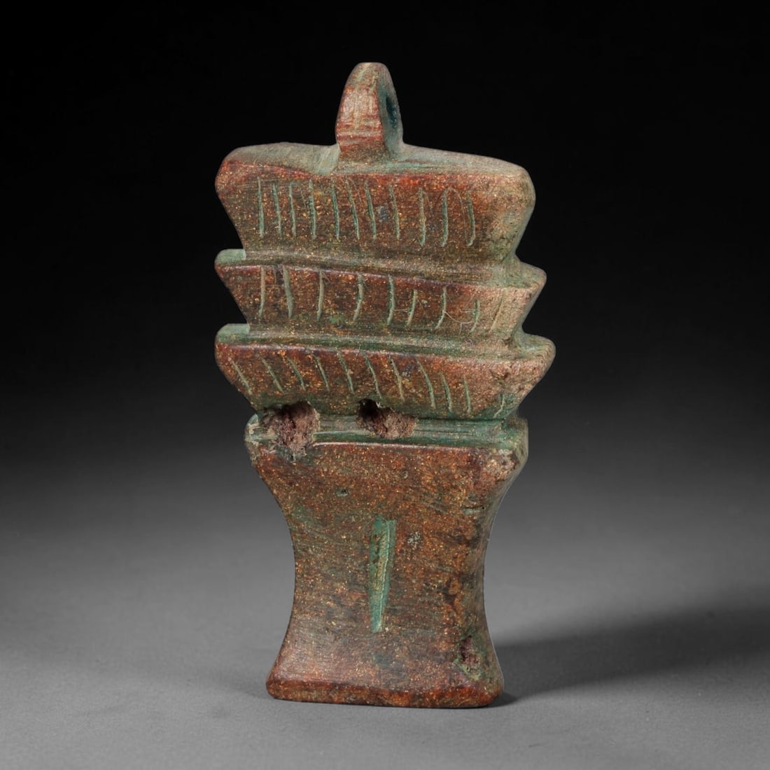 Ancient Egyptian Late Period Turquoise Faience Djed Pillar Amulet (664-30 BCE), 80AE: Classic three-tiered Djed Pillar funerary amulet molded from Egyptian faience with weathered turquoise glaze over terracotta clay core, featuring vertical ribbed incisions across each tiered capital s