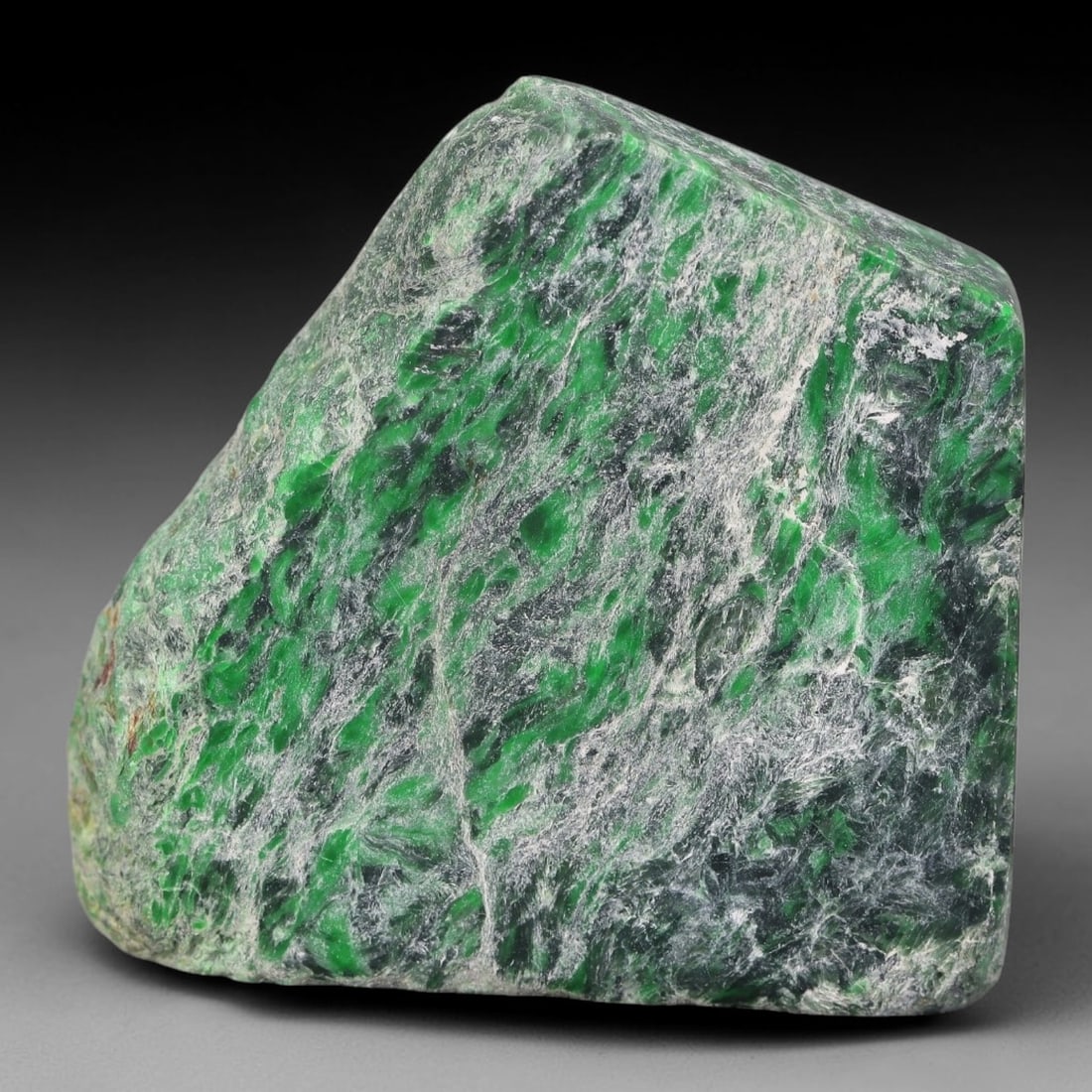 189ct Natural Type A Burmese Jadeite Jade Sliced Rough, 16FB: This specimen is a sliced rough block of natural Type A Burmese jadeite jade. The interior displays natural colour zoning with visible mineral veining and crystalline patterns typical of unprocessed j