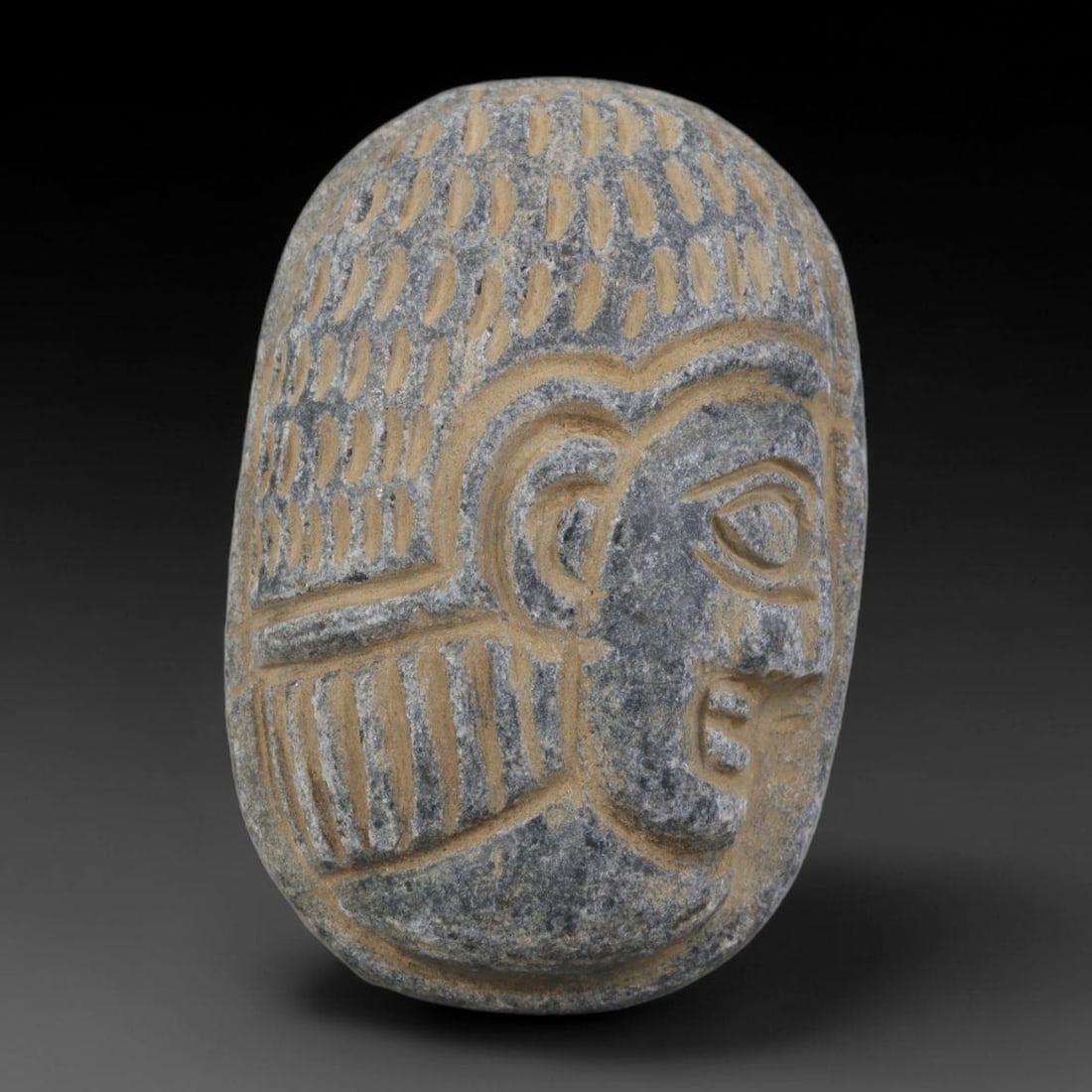 Antique Egyptian Schist Intaglio with Profile Head Carving, 33AA: Hand-carved antique Egyptian amulet tablet crafted from dark grey schist stone, measuring 4.5cm x 3cm. The front face features a finely detailed profile human head with incised stylized hair rendered 