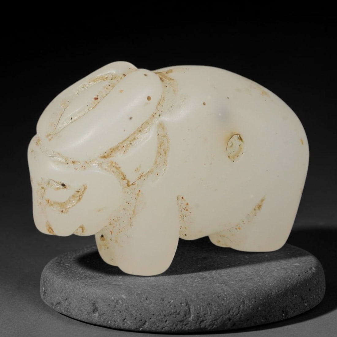 Ancient Western Asiatic White Quartzite Rodent Zoomorphic Amulet (1000-600 BCE), 21AB: Miniature hand-carved milky white quartzite talisman shaped as a stylized rodent figure, a sacred symbolic pendant from ancient Western Asiatic cultural craft traditions. Simplified rounded body form 