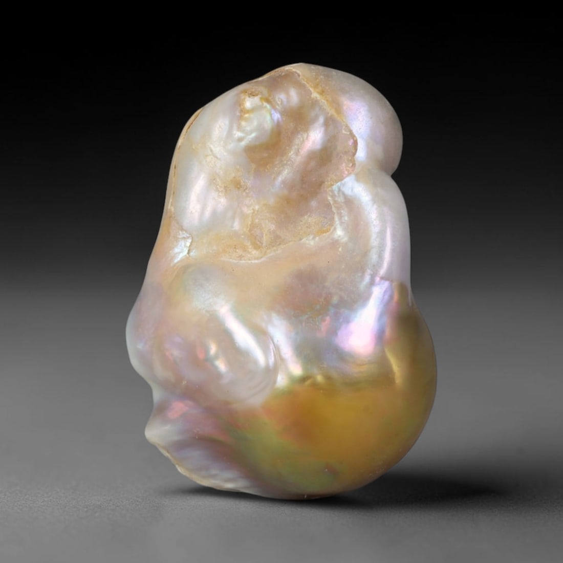 Natural Freshwater Keshi Pearl - Iridescent Baroque Pearl Ornament, 59AE: A natural freshwater keshi pearl with organic asymmetrical baroque shaping, exhibiting soft creamy blush base tones with shifting pastel pink, lavender and pale gold iridescent luster across its smoot