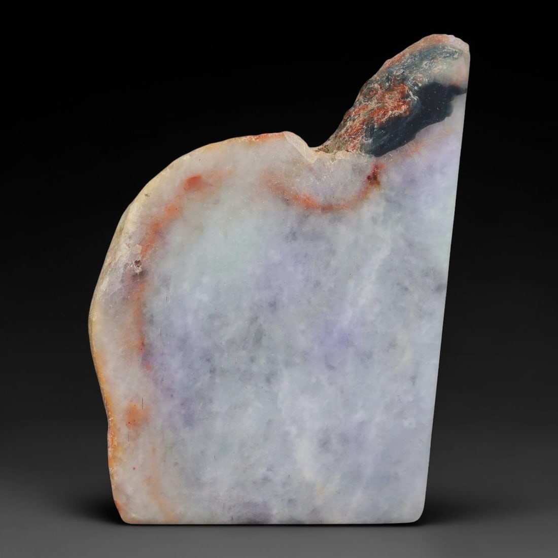325ct Natural Type A Burmese Jadeite Jade Sliced Rough, 63FB: This specimen is a sliced rough block of natural Type A Burmese jadeite jade. The interior displays natural colour zoning with visible mineral veining and crystalline patterns typical of unprocessed j